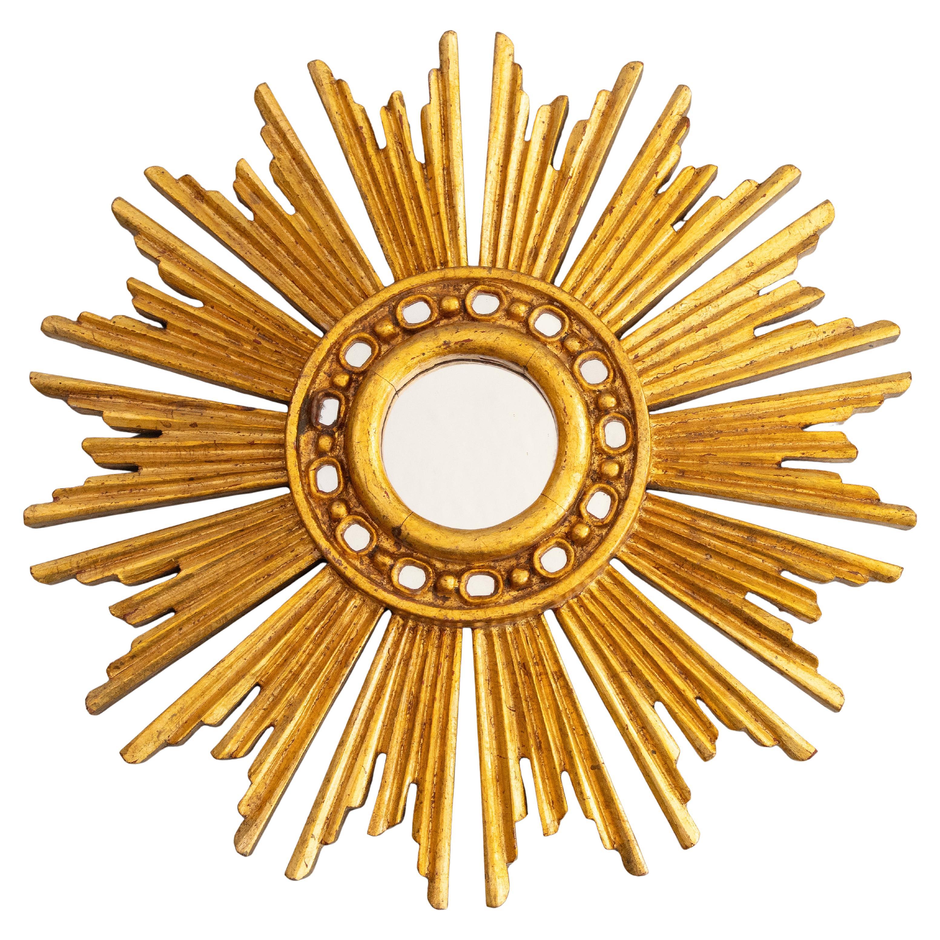 Specchio francese di metà secolo in legno dorato a raggiera