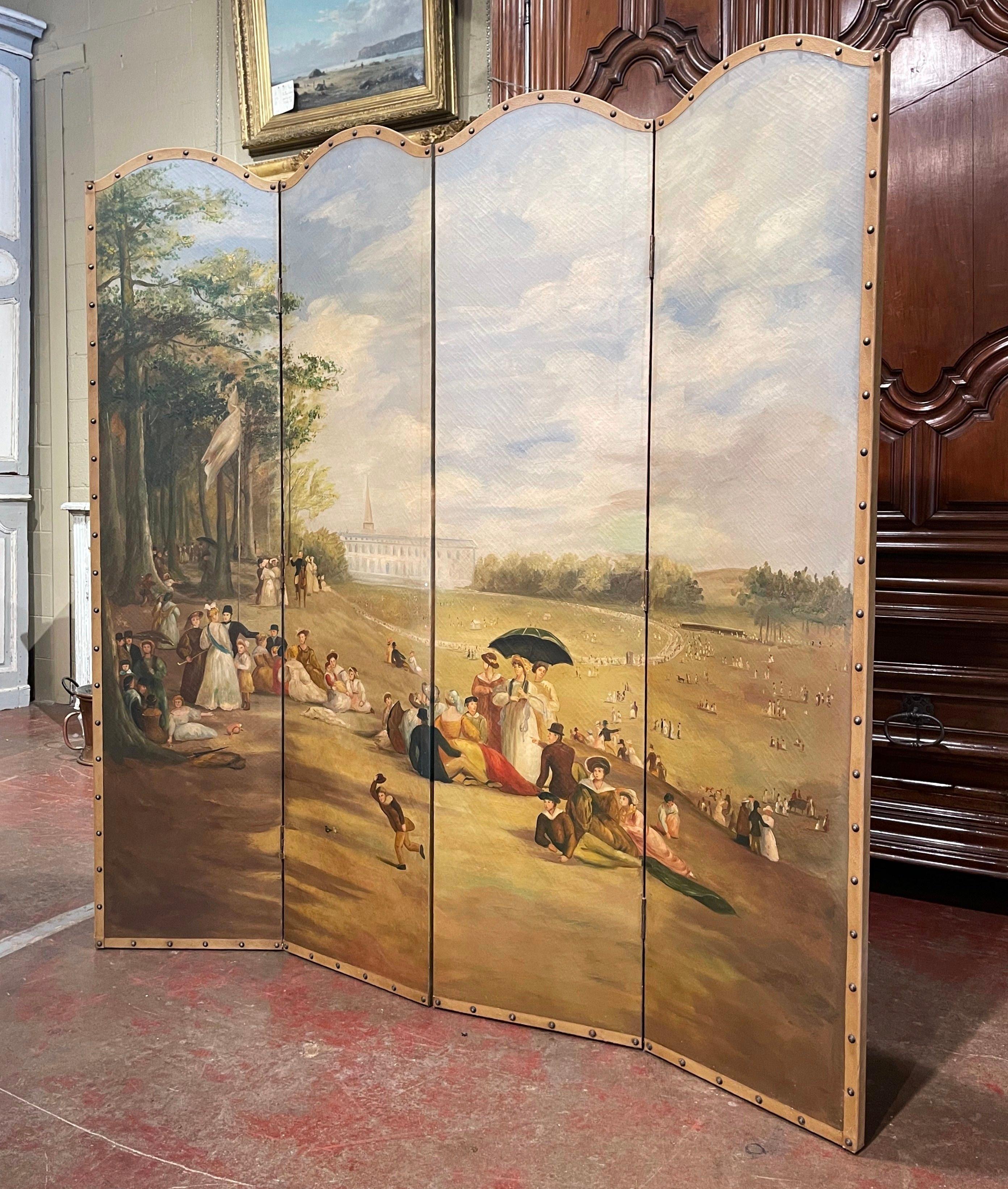 Decorate a dining or living room with this elegant and colorful vintage screen. Crafted in France circa 1970, the art work with decorative arched top, depicts an outdoor garden scene on a sunny day, with figures gathering in a verdant park landscape