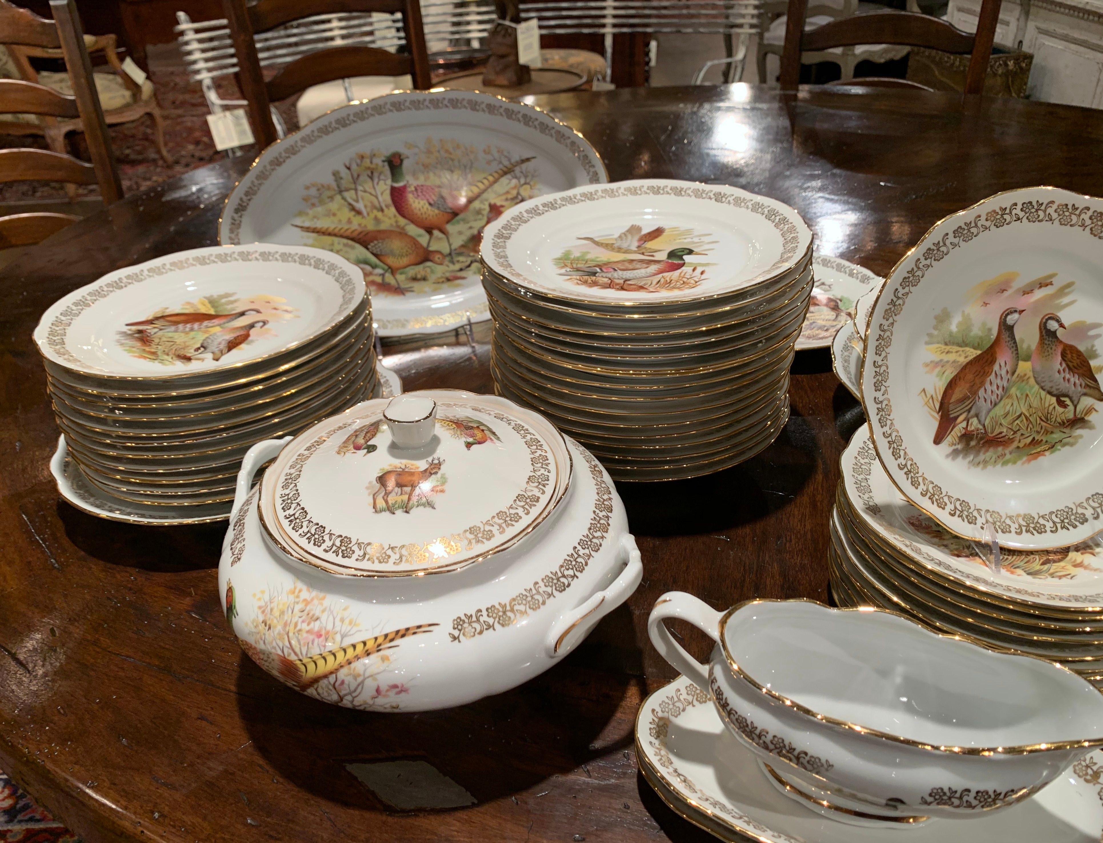Midcentury French Hand Painted Porcelain and Gilt Hunt Motifs Dinnerware Set In Excellent Condition In Dallas, TX
