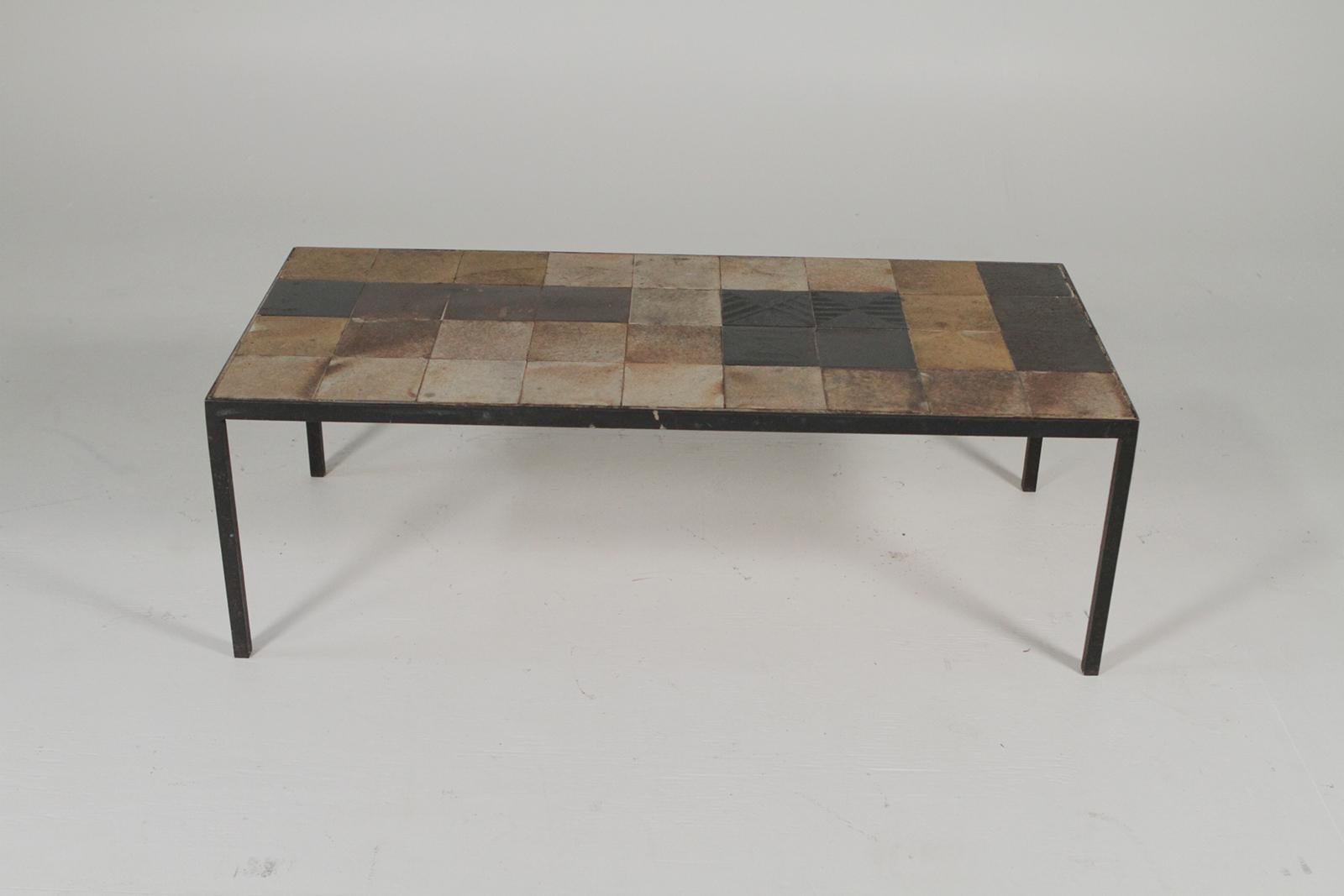 Midcentury French iron and tile top cocktail/ coffee table
 Dimensions 36”W X 16” D X 12” H.