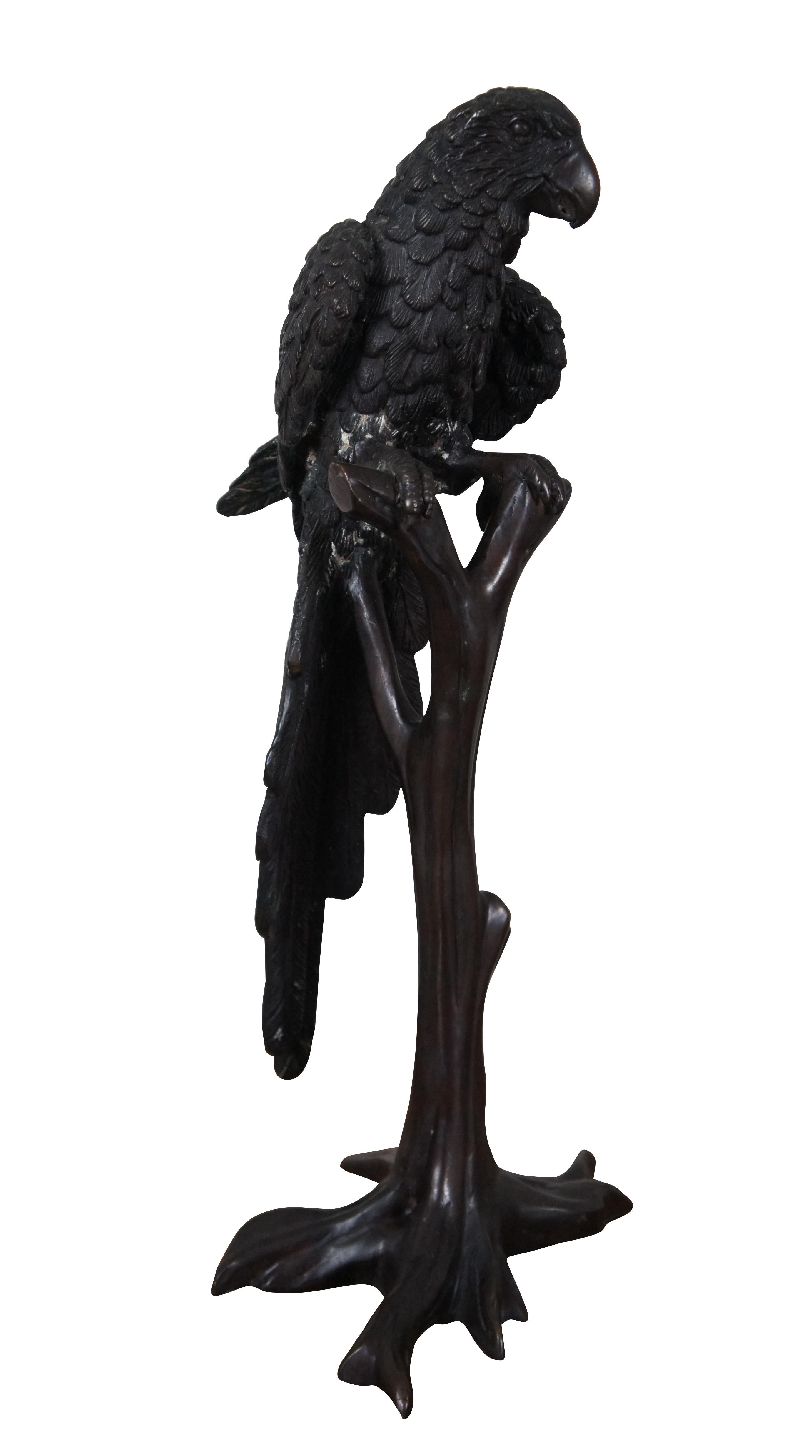 Mid century pair of French bronze Macaw Parrots / birds perched on stands with nice patina, signed Kulang.  The parrots are shown with impressive life like design to the feathers, beaks and eyes, each with a unique expression and