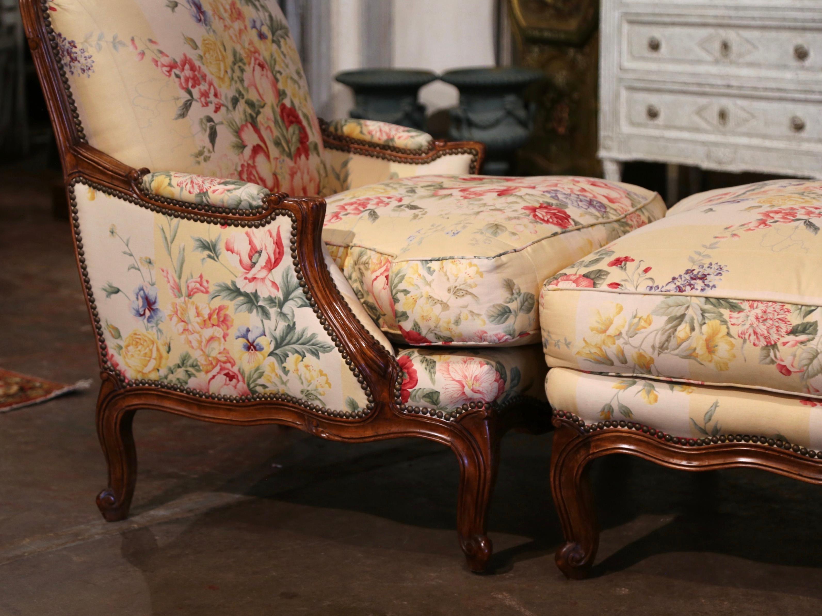 This beautiful antique fruitwood two-piece chaise, was crafted in Provence, circa 1980. The set includes a large fauteuil with loose cushion and the matching ottoman. Each piece stands on cabriole legs ending with sabot feet over a scalloped apron.