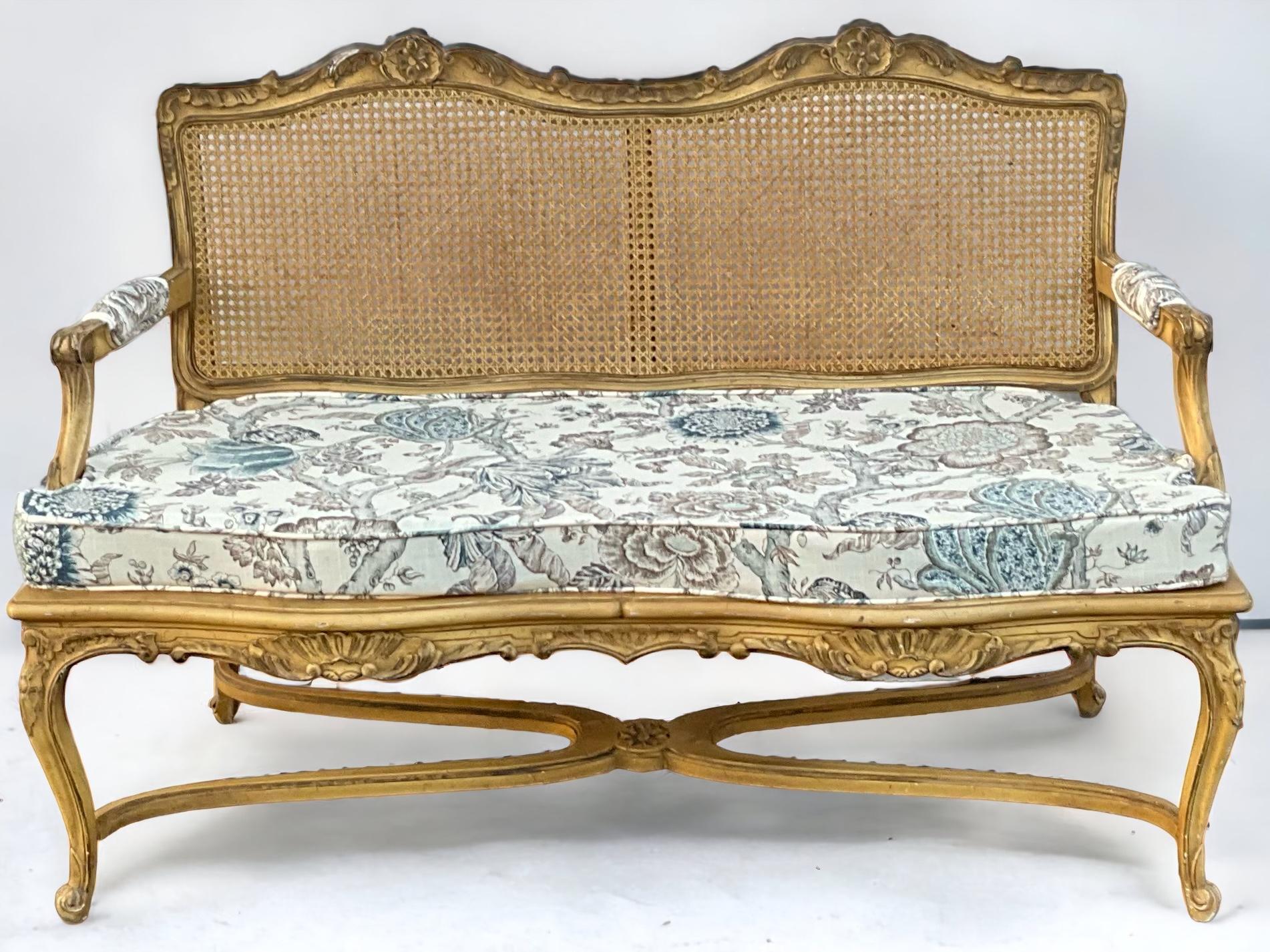 North American Mid-Century French Louis XV Style Caned and Carved Settee in Floral Linen For Sale