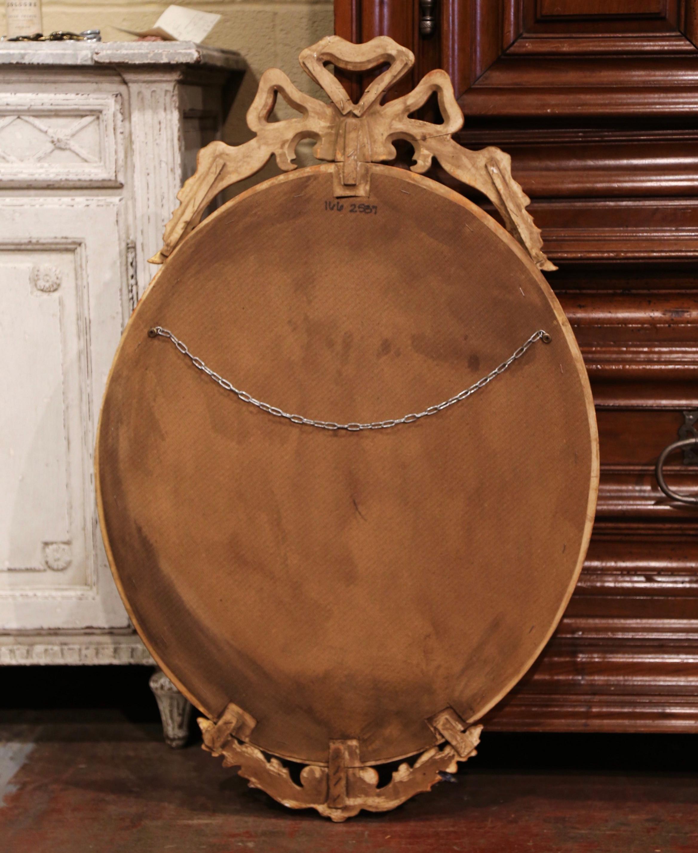 Mid-Century French Louis XVI Carved Giltwood Oval Wall Mirror with Beveled Glass 1