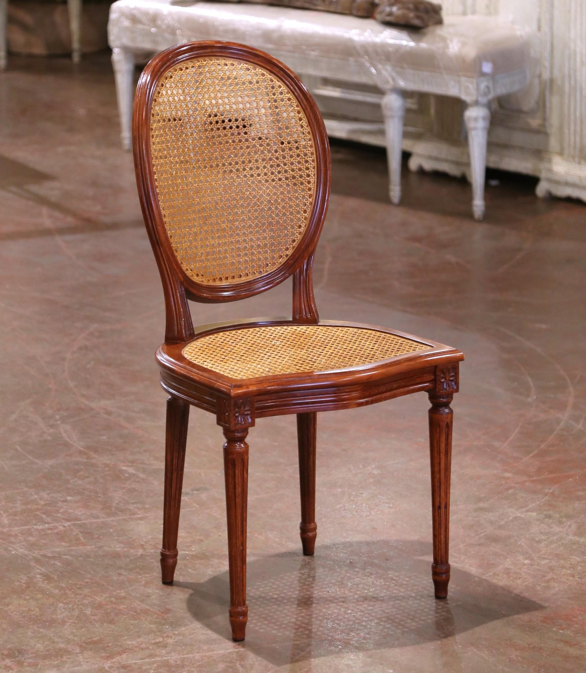 Français Mid-Century French Louis XVI Carved Walnut and Cane Dining Chairs, Set of Six en vente