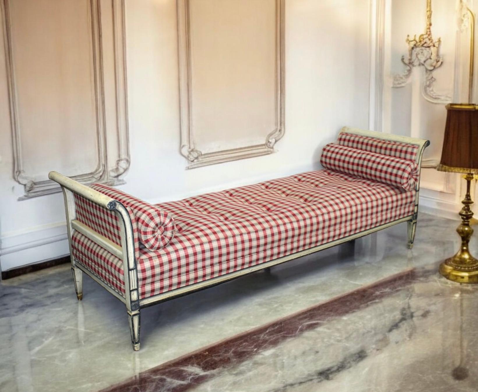 This is a large scale French Louis XVI Directoire style daybed in red check upholstery. The painted frame is ivory with charcoal gray accents. The upholstery is vintage with one notable spot that I will attempt to get out. 

My shipping is running