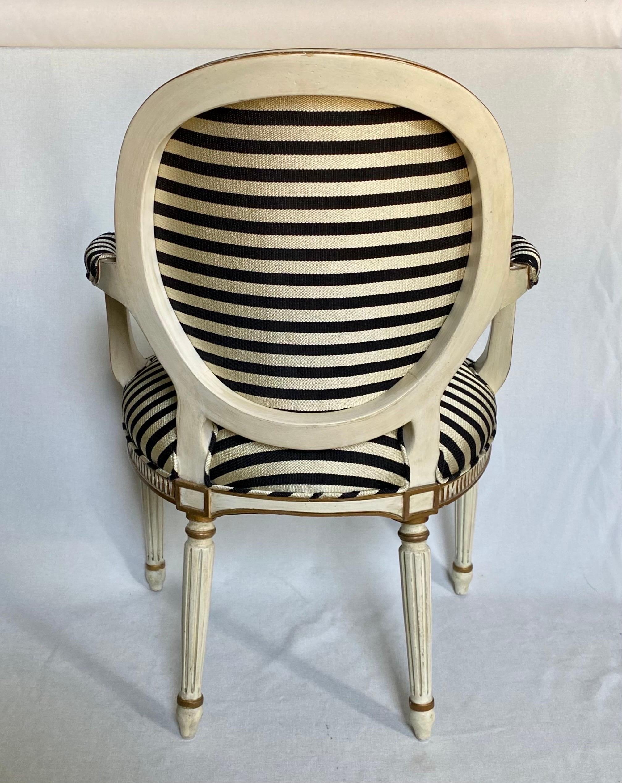 Carved Midcentury French Louis XVI Style Gilt Painted Striped Armchair For Sale