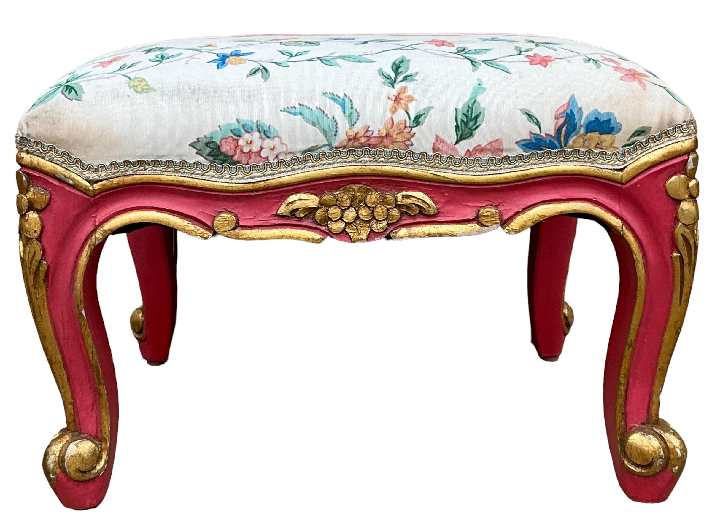 This is a pair of mid-century Venetian Louis XV style ottomans. They are painted pink with gilt floral accents and trim. Sadly, the upholstery is in need of replacing. They are unmarked.