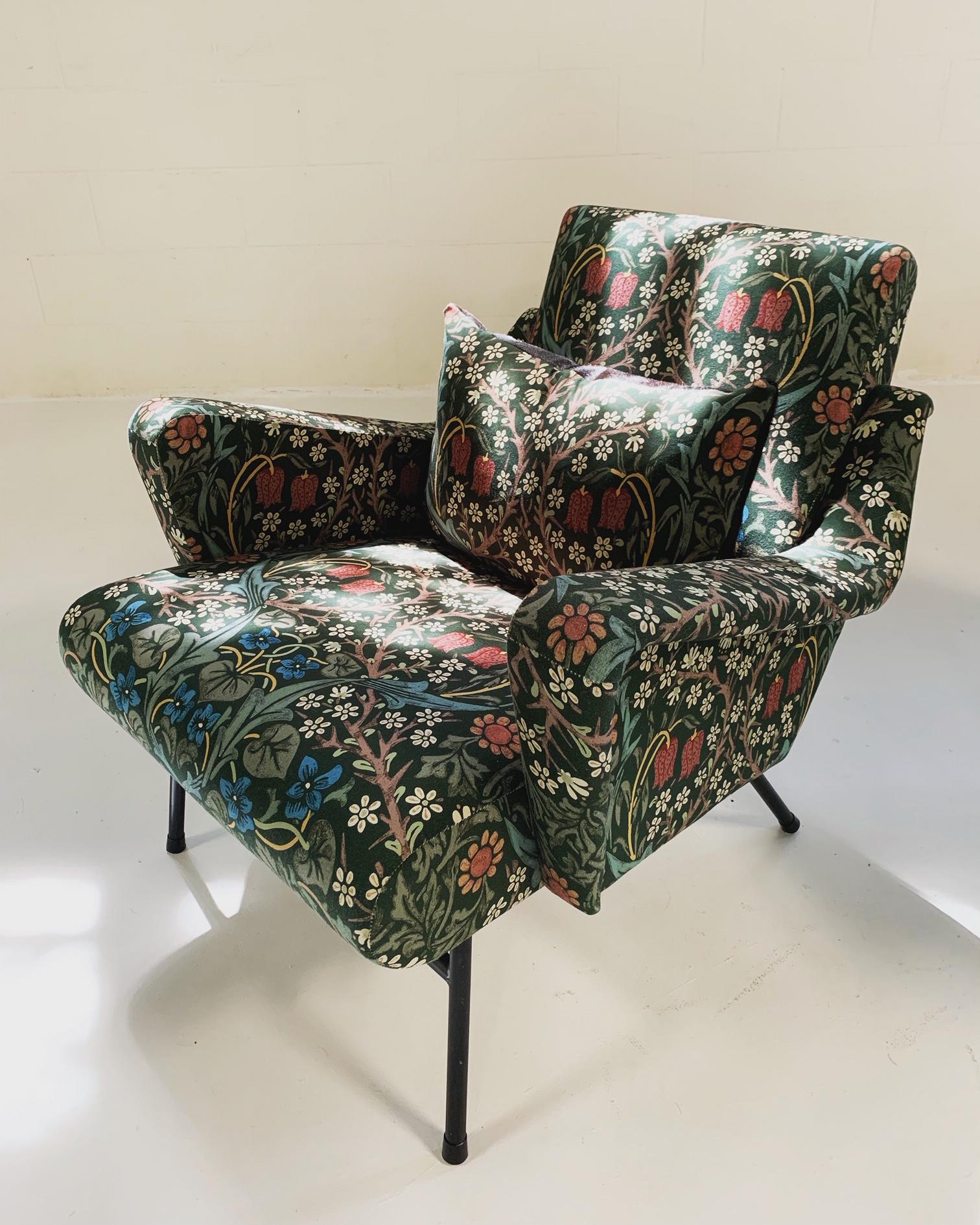The traditional floral of William Morris on such a modern silhouette! We love it. The lines on these lounge chairs are so dramatic. The deep seat and structured arms are exceptionally comfortable. We also designed a feather-filled lumbar pillow for