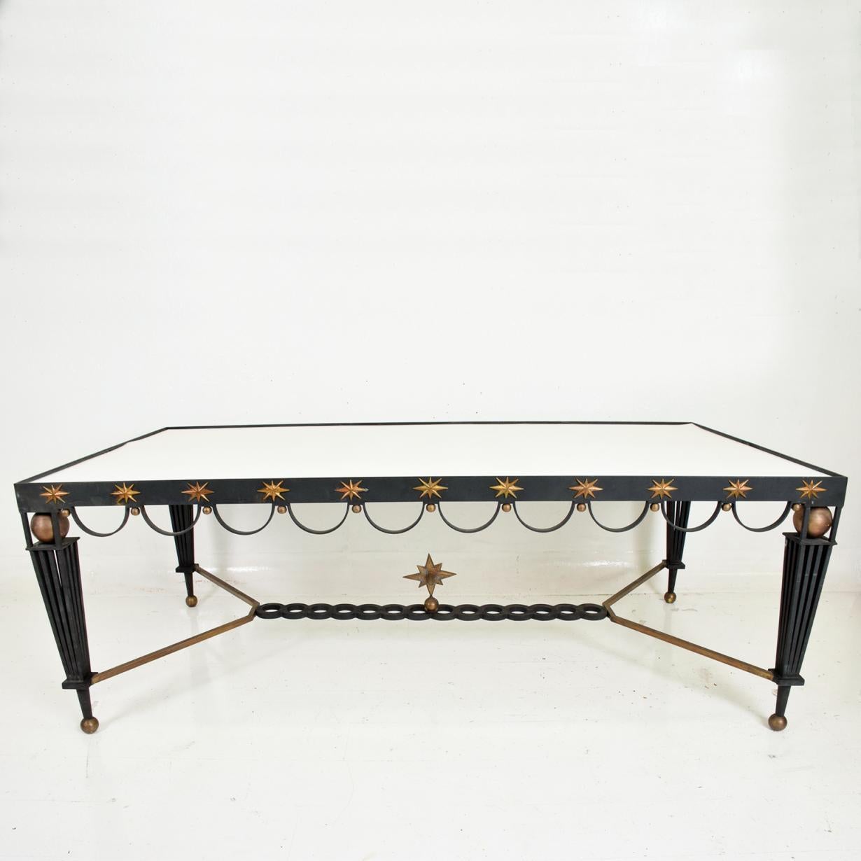 For your consideration, a midcentury Mexican modernist star dining table attributed to Arturo Pani. Made in Mexico circa 1950s. Iron painted in black with bronze accents.
There is no tabletop included.
Dimensions: 82 3/4
