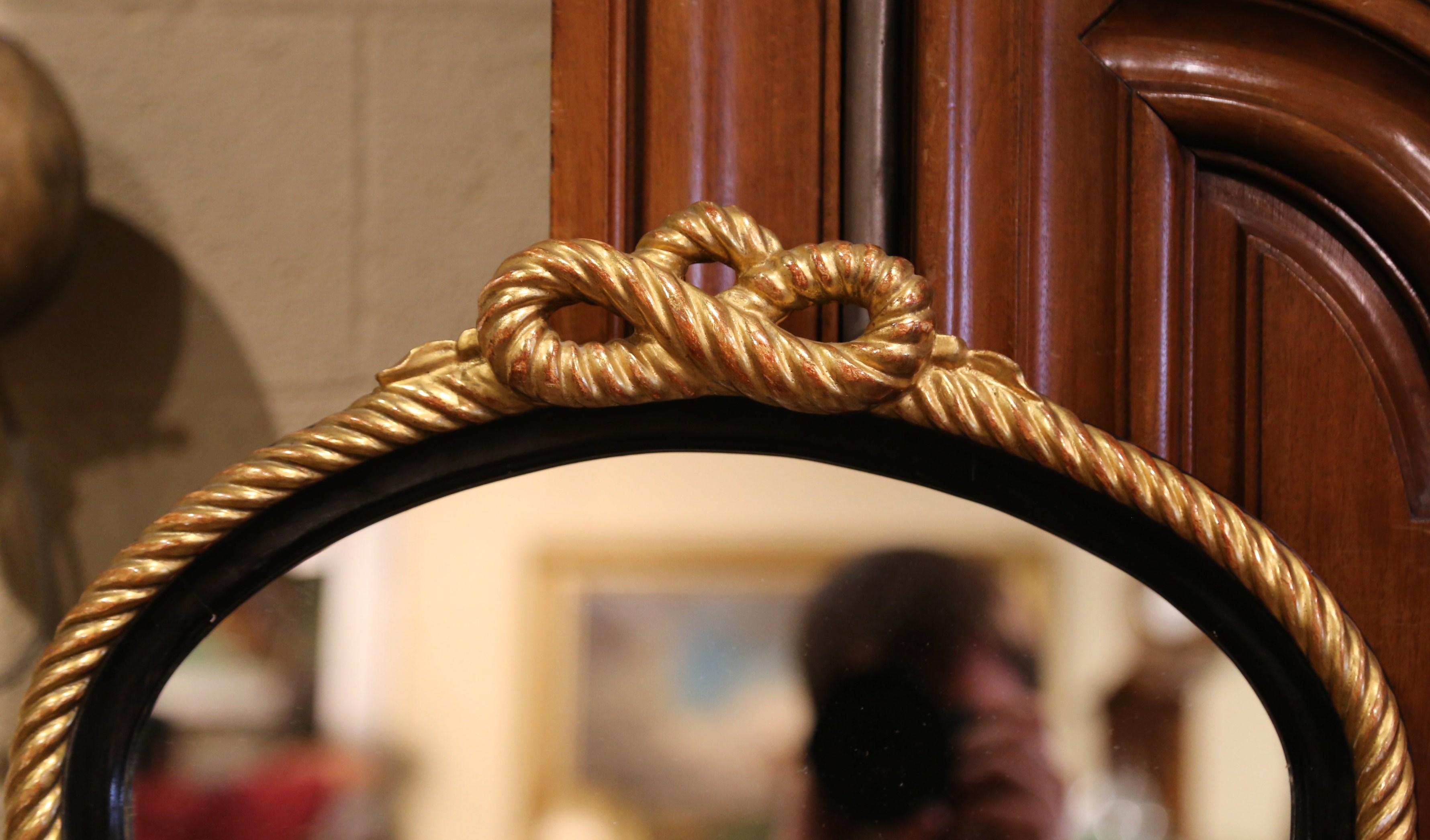 Mid-Century French Napoleon III Blackened and Gilt Wall Mirror with Roped Bow In Excellent Condition For Sale In Dallas, TX