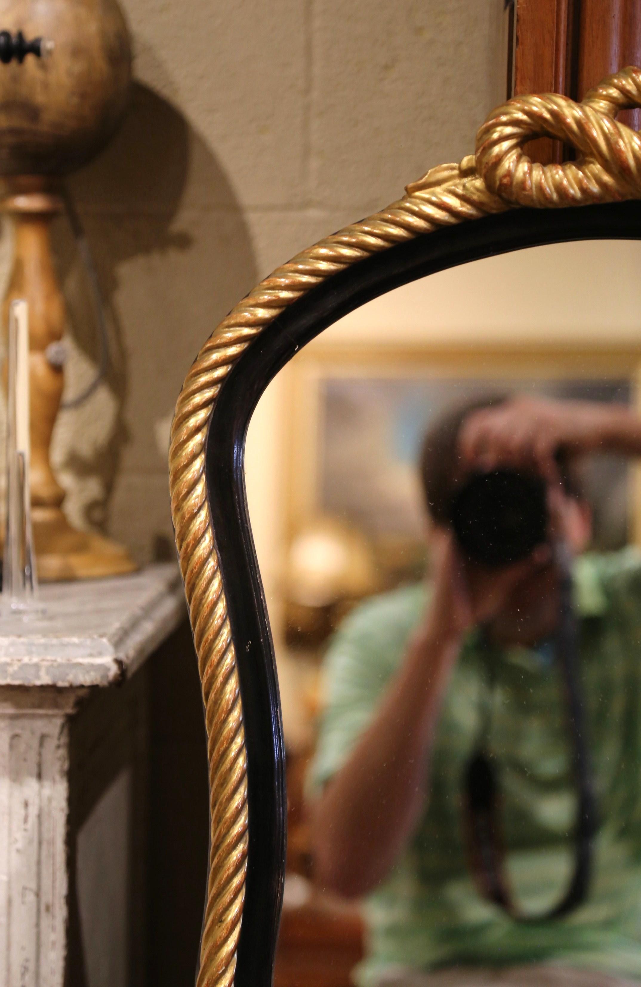 Gold Leaf Mid-Century French Napoleon III Blackened and Gilt Wall Mirror with Roped Bow For Sale