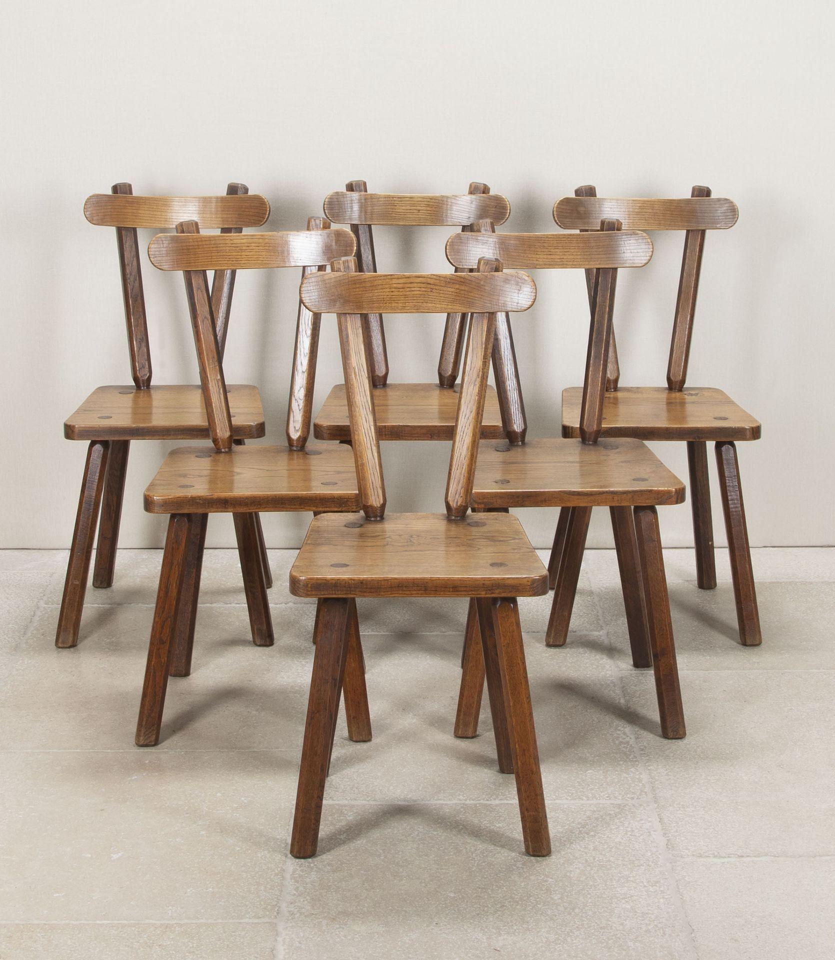 Mid-Century French oak farmhouse table and six matching chairs. Having been cleaned and wax polished. Circa 1960.