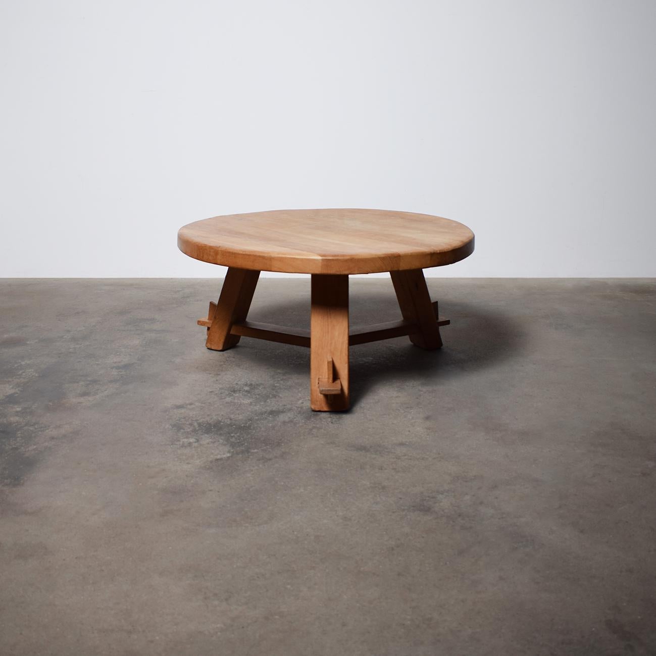 Beautiful handmade Artisan French coffee table. The table is made of solid French oak. The Round top is made of narrow beams which gives a beautiful effect. The Tripod base is also made of solid oak with beautiful constructed details.
