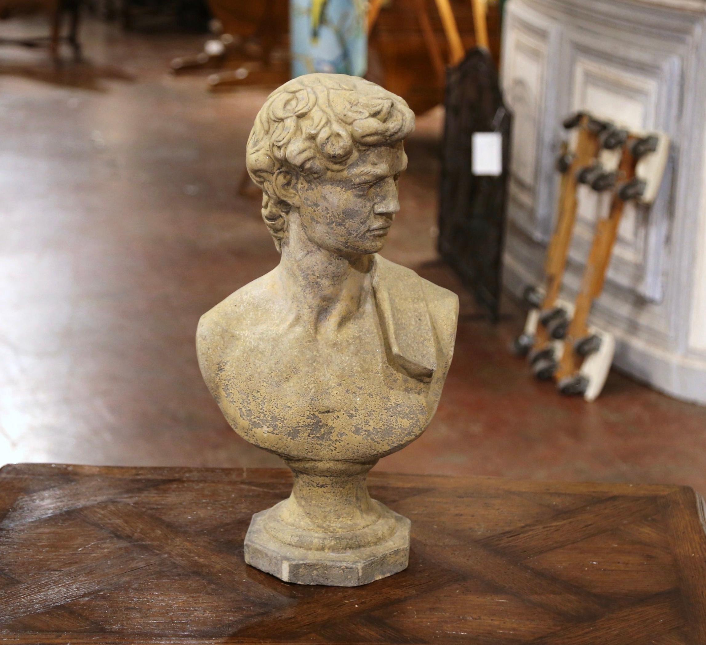 Decorate a garden or patio with this elegant antique outdoor statue. Carved of stone in France circa 1950, the figure depicts a Roman gentleman bust, head turned and wearing a cloth on his shoulder. The statuary sculpture is in excellent condition