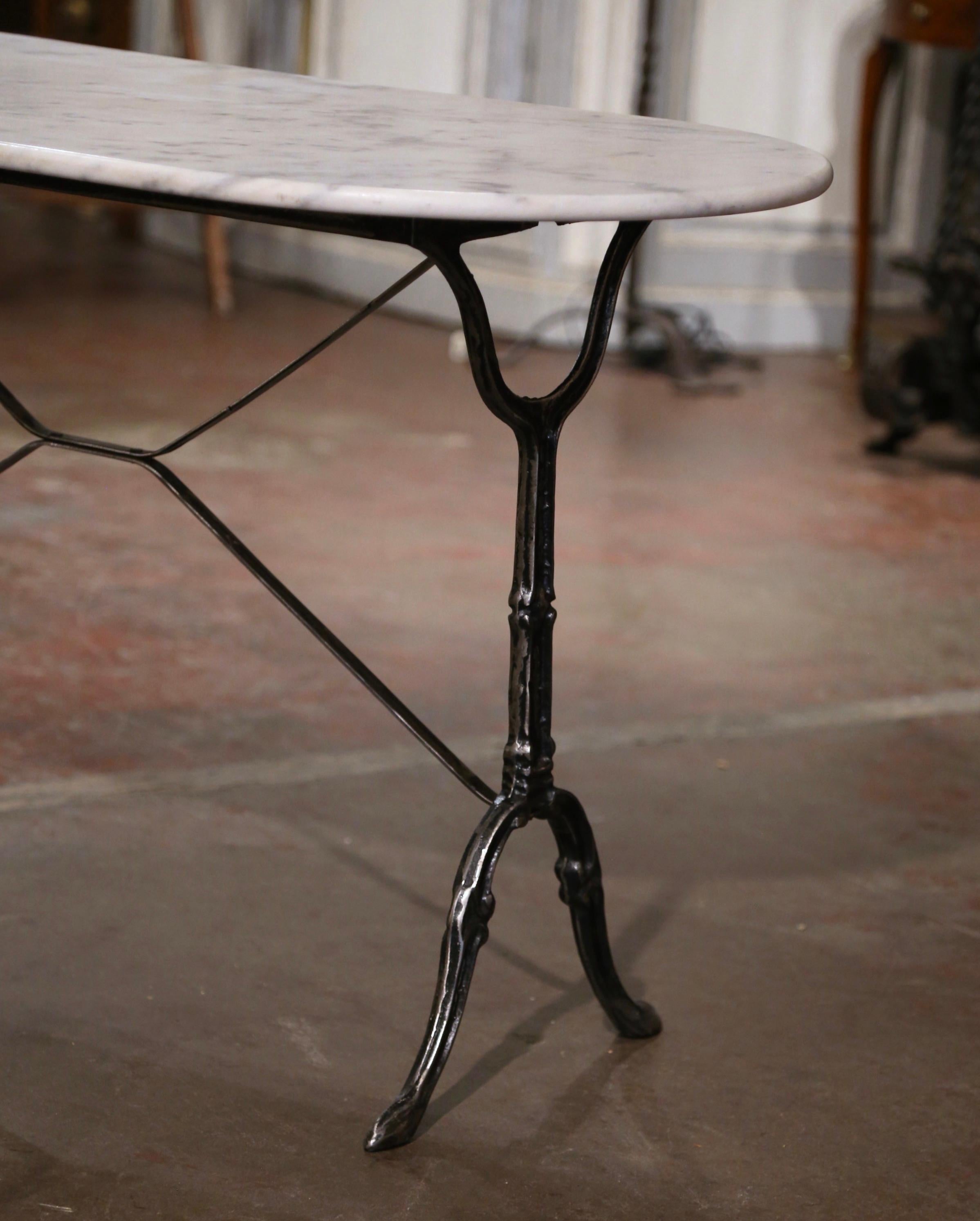 Mid-Century French Oval Marble Top Polished Iron Bistrot Table In Excellent Condition For Sale In Dallas, TX