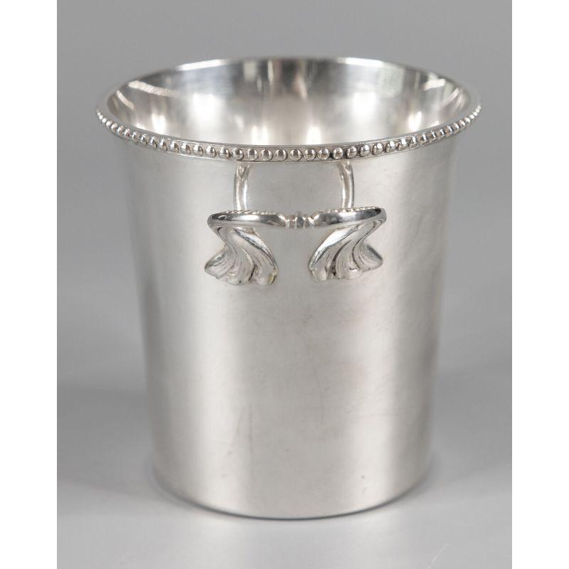 A superb vintage petite silverplate ice bucket made in France. Hallmarked on reverse. This stylish ice bucket has a lovely beaded rim and sleek design, perfect for the modern home. Measurements are 4.75