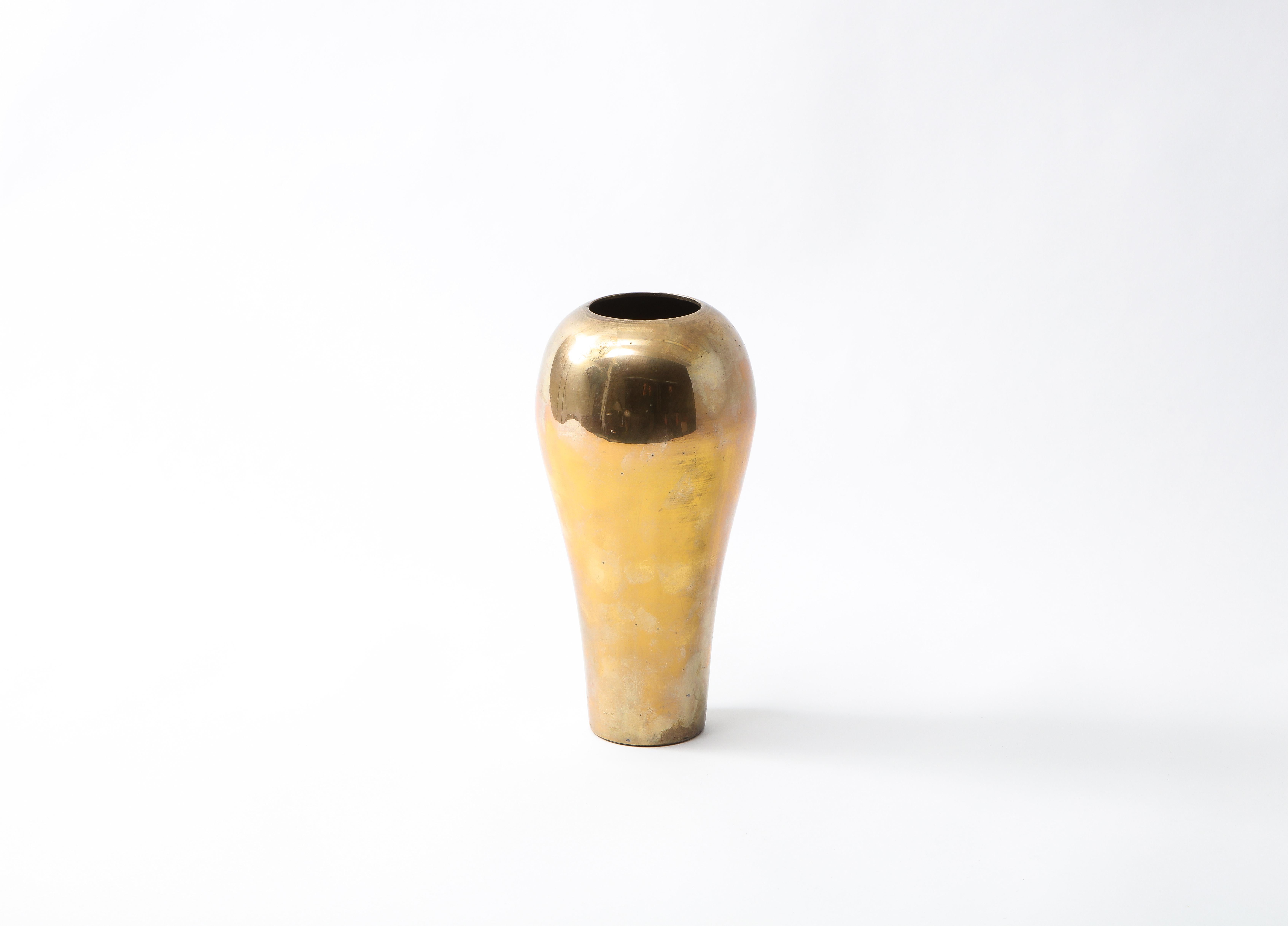 Mid-Century French polished bronze vase that mushrooms out towards the top. The exterior boasts an elegant, antique patina. Reminiscent of the forms of Brancusi.