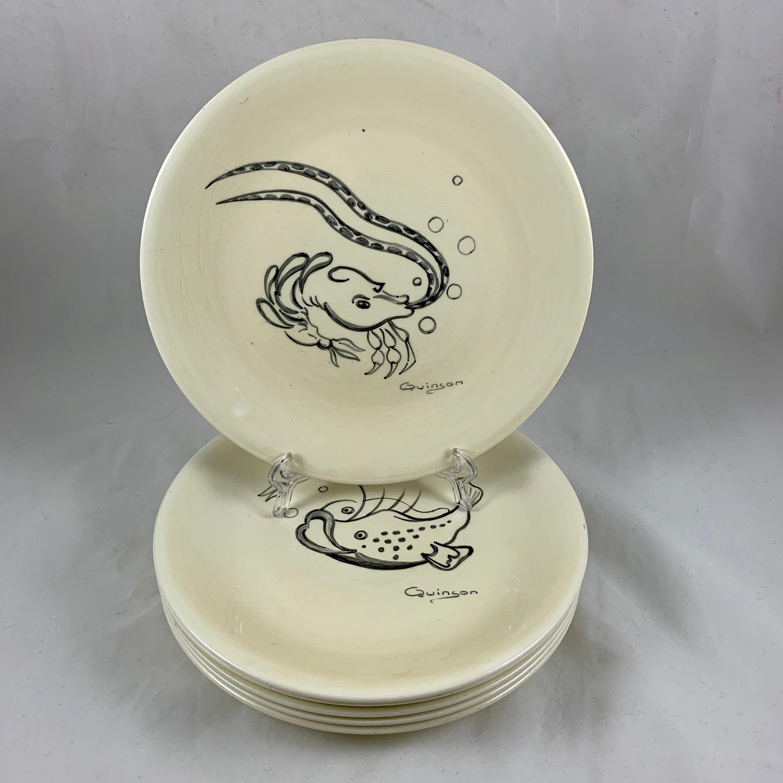 A set of six midcentury French pottery fish plates, hand-painted by the ceramist Paulette Quinson, (1899-1984) Beginning in 1924, Quinson ran a well known art pottery studio in Marseille, on the French Mediterranean coast. She collaborated with the