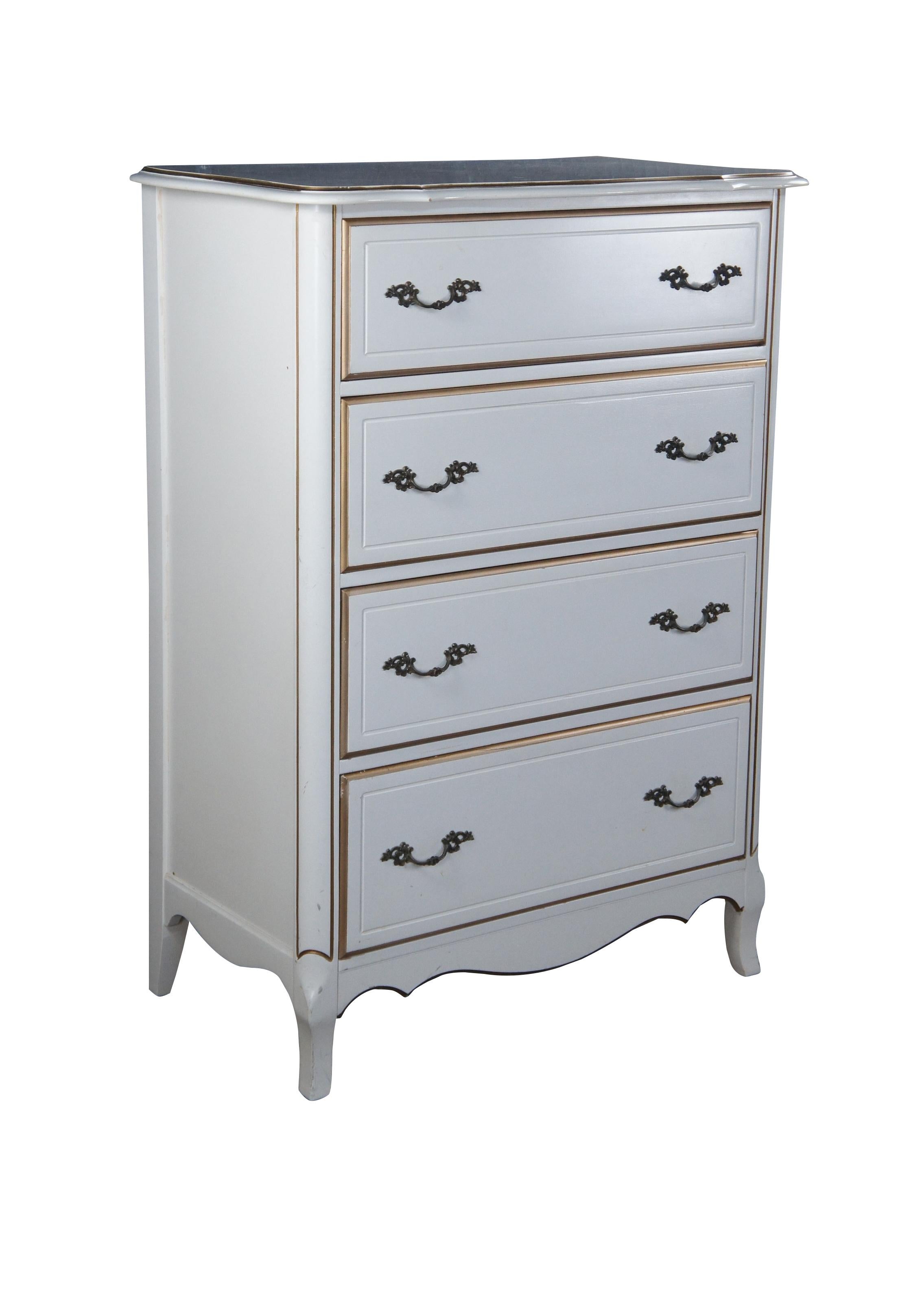 Mid century French Provincial dresser or chest or drawers featuring rectangular form with serpentine edges and white and gold accents.  7065-40, 745-H-62

Dimensions:
19