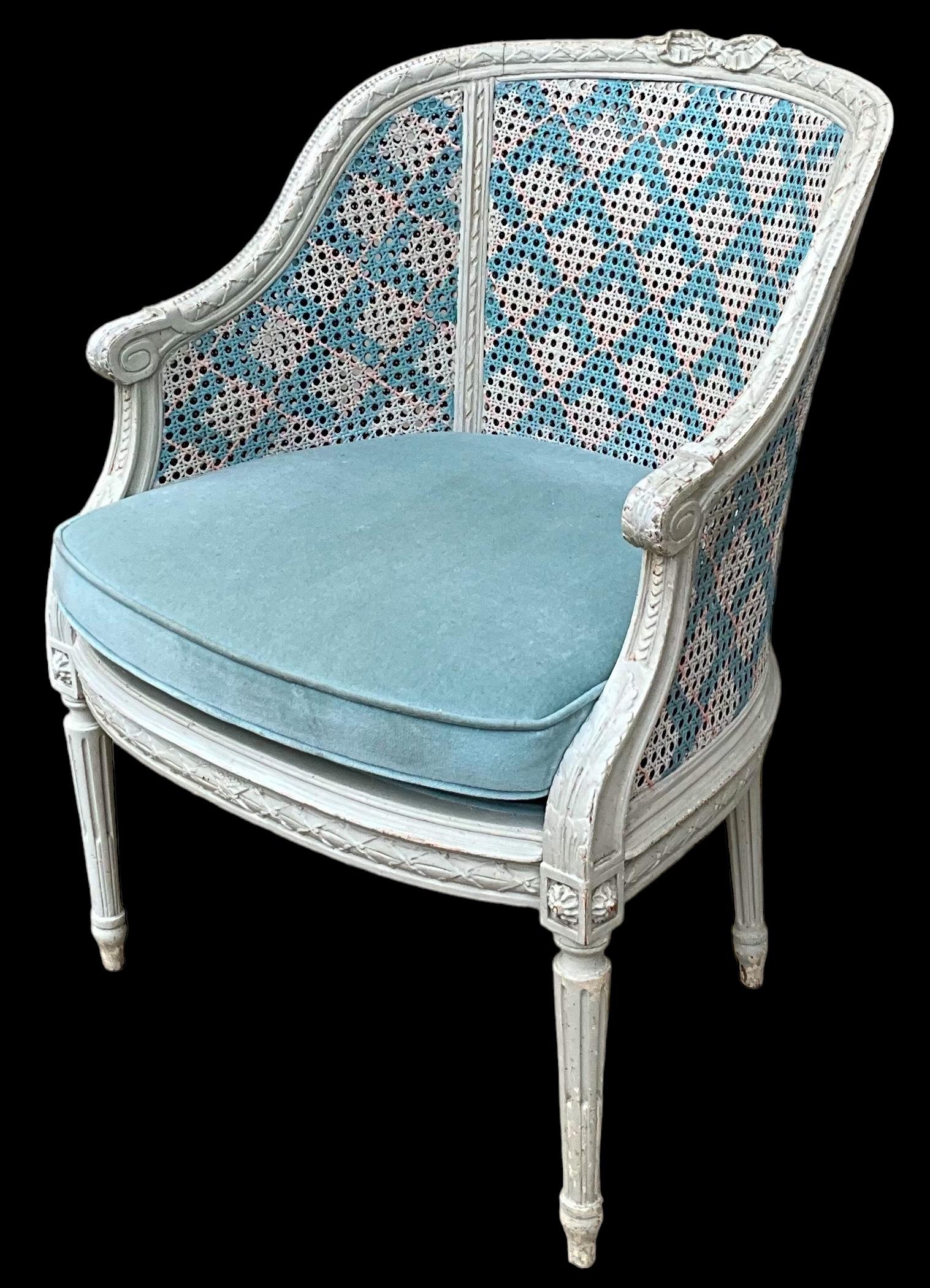 This is a lovely French hand painted carved fruitwood chair that has been hand painted in a lovely blue, white and pink diamond. The cushion is vintage and shows lite wear. It is unmarked and most likely dates to the 40s or 50s.
