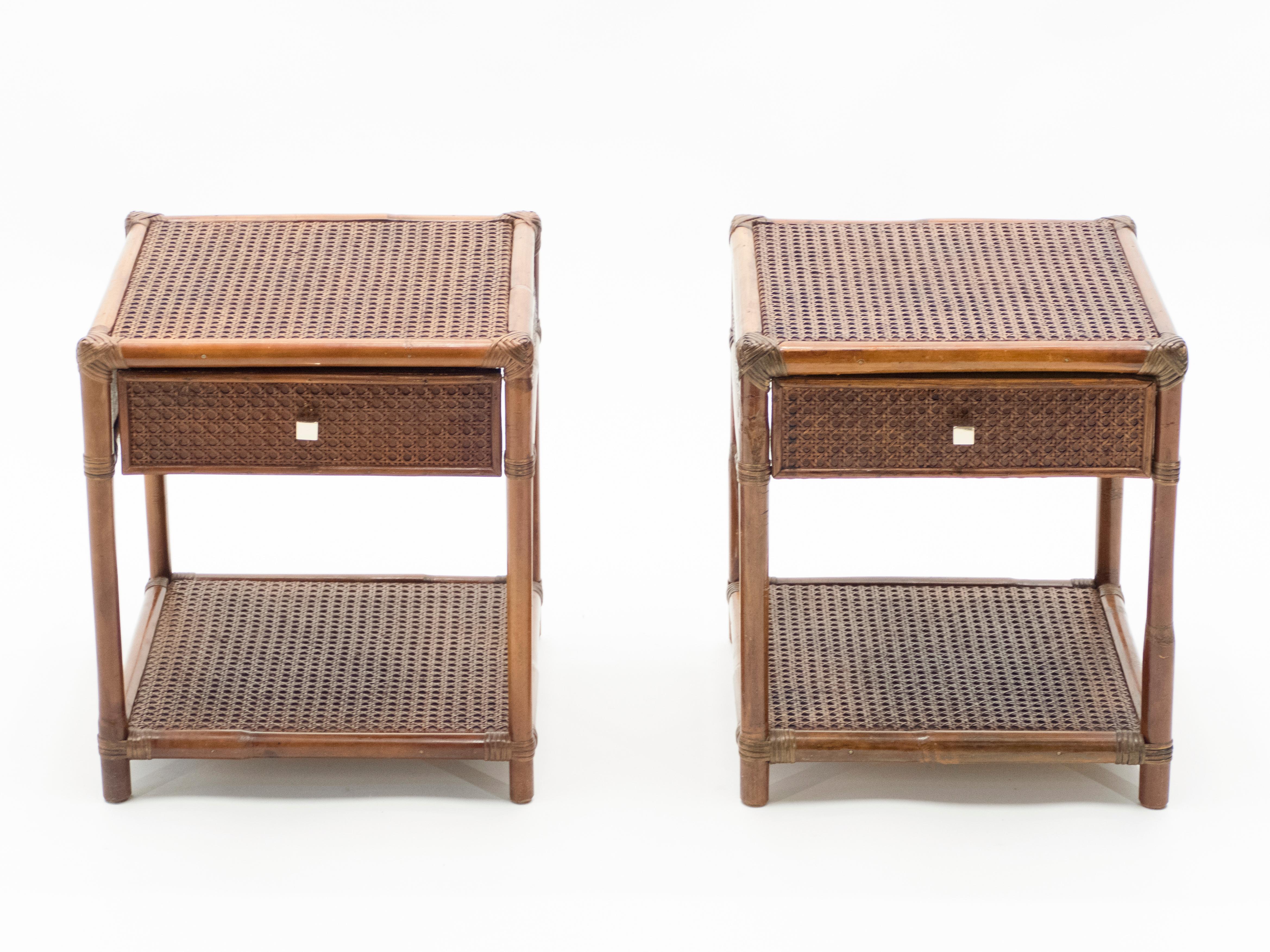 This pair of bamboo nightstands from the Mid-Century Modern French Riviera period are bursting with nostalgia. A light brown bamboo structure, cane top and drawer with brass handle would feel right at home in a stylish vacation house by the water.