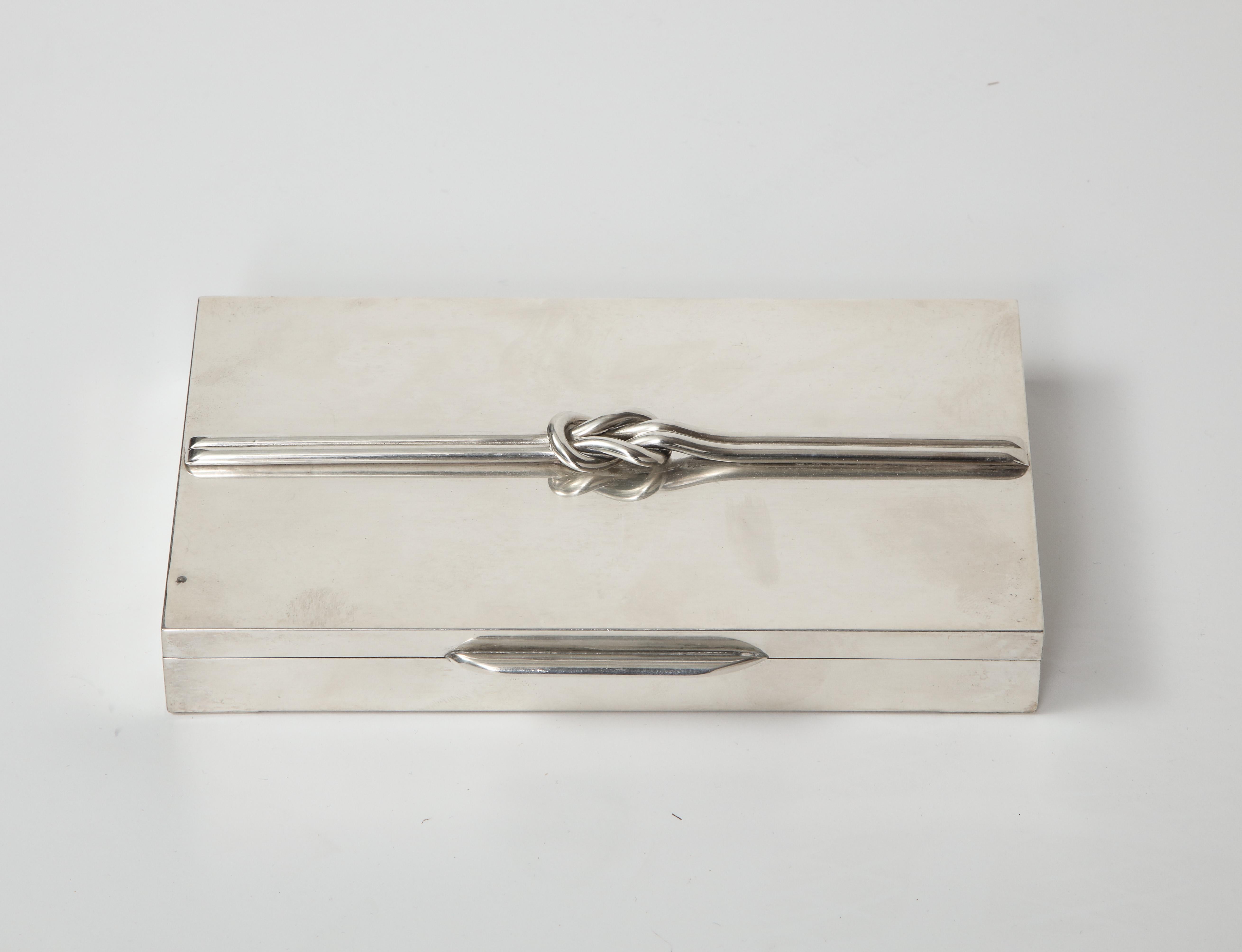 1950s French sterling silver box with knot detail and hallmark on bottom frame.