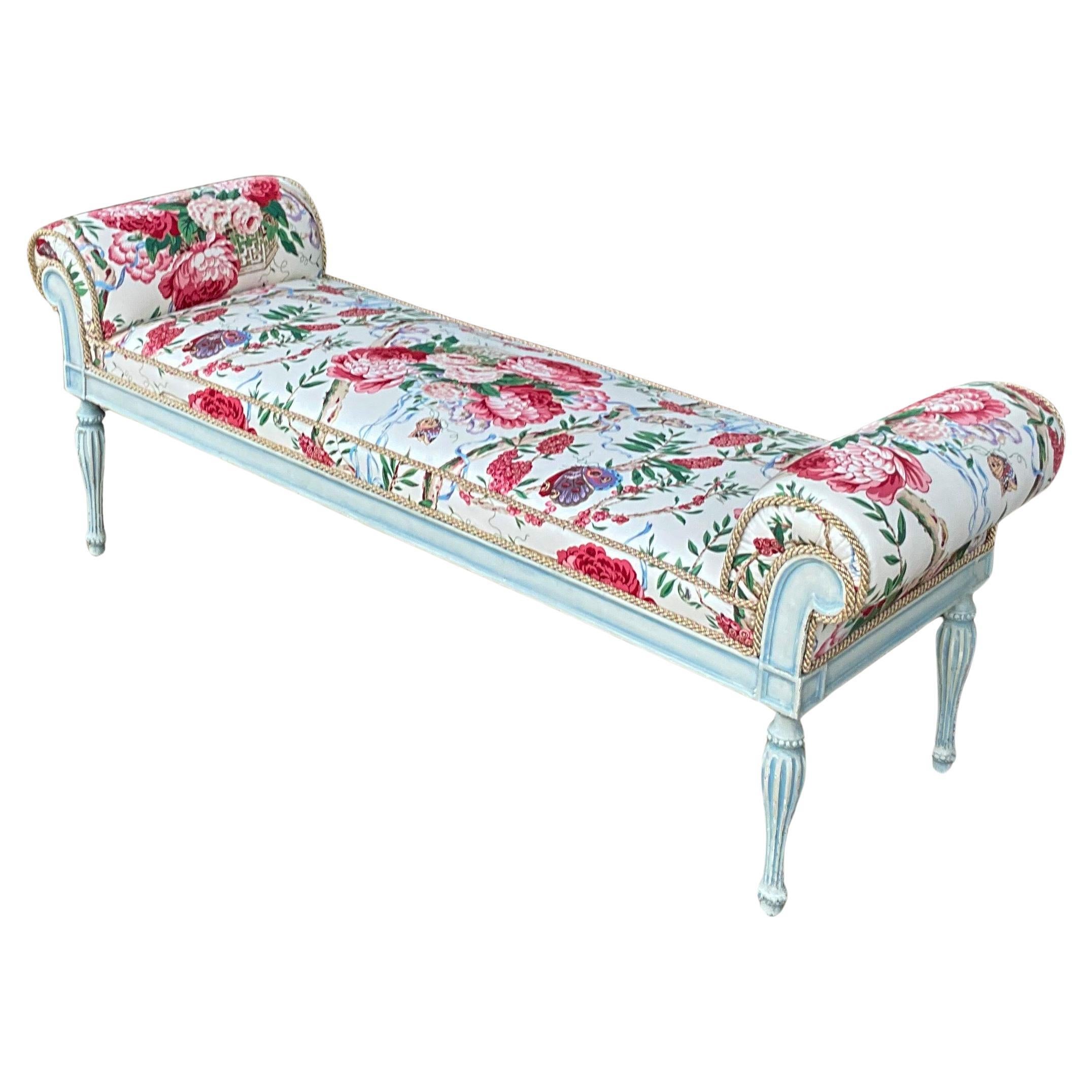 This is a lovely French style blue and white painted bench with vintage floral cotton chintz upholstery. The upholstery is in very good condition. It is unmarked.


