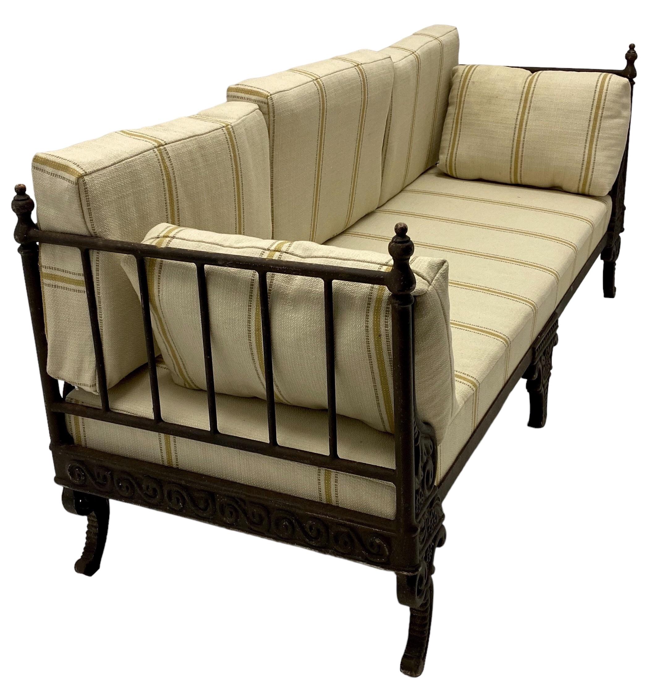 This is a mid-century reproduction of an antique French daybed. The linens are a recent addition. The frame is lighter in weight …more like a cast aluminum with intentional distressing. It is unmarked and in very good vintage condition.

My shipping