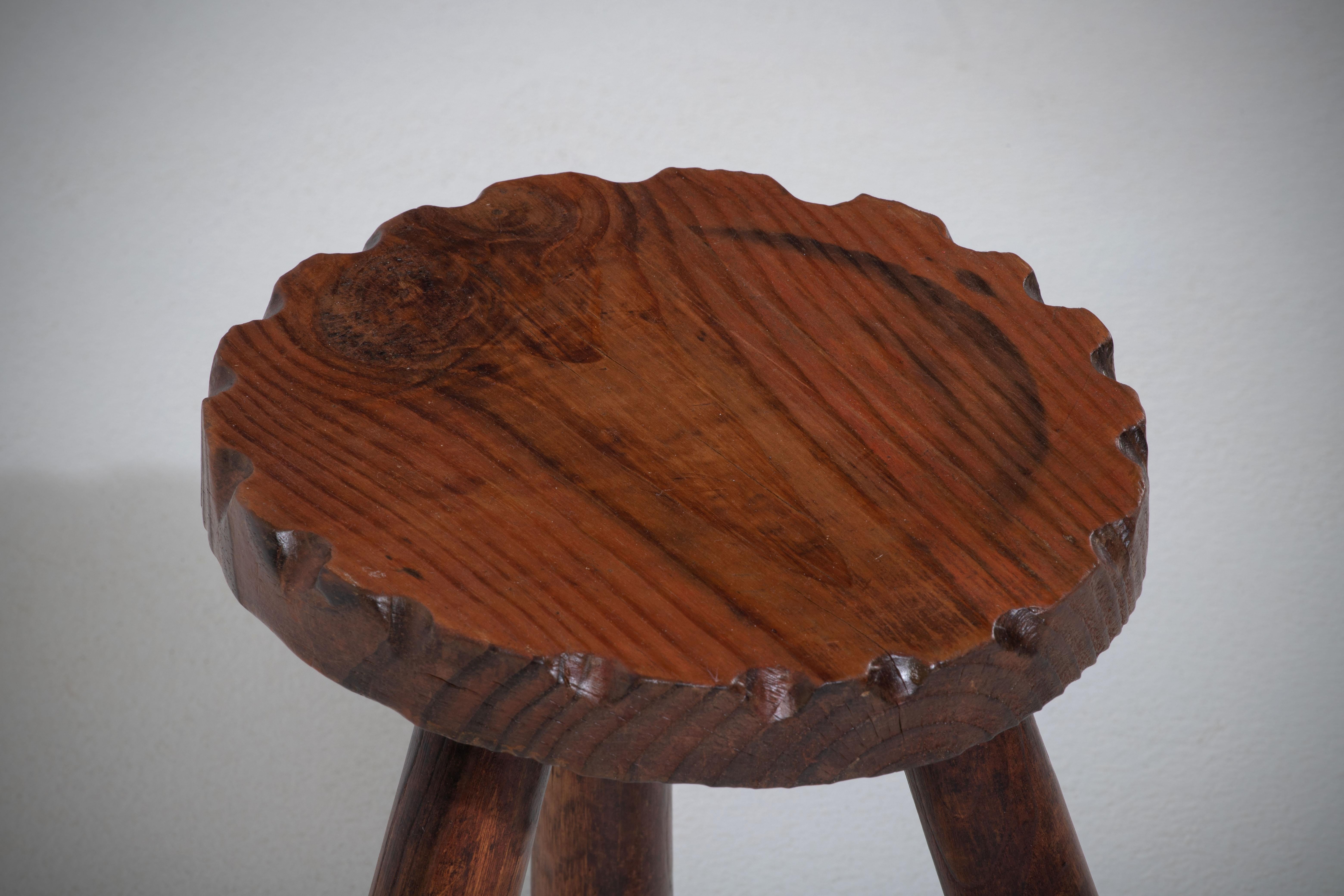 Hand-Carved Midcentury French Walnut Stool, Jean Touret-Inspired, 1960s For Sale
