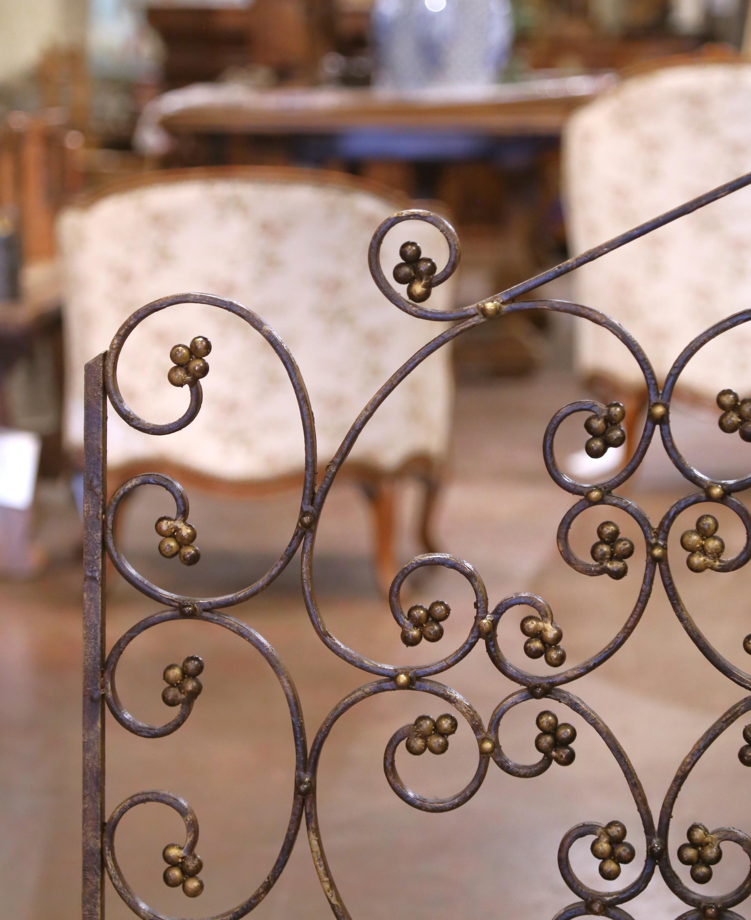 Forged Mid-Century French Wrought Iron Decorative Fire Screen with Gilded Rosettes For Sale