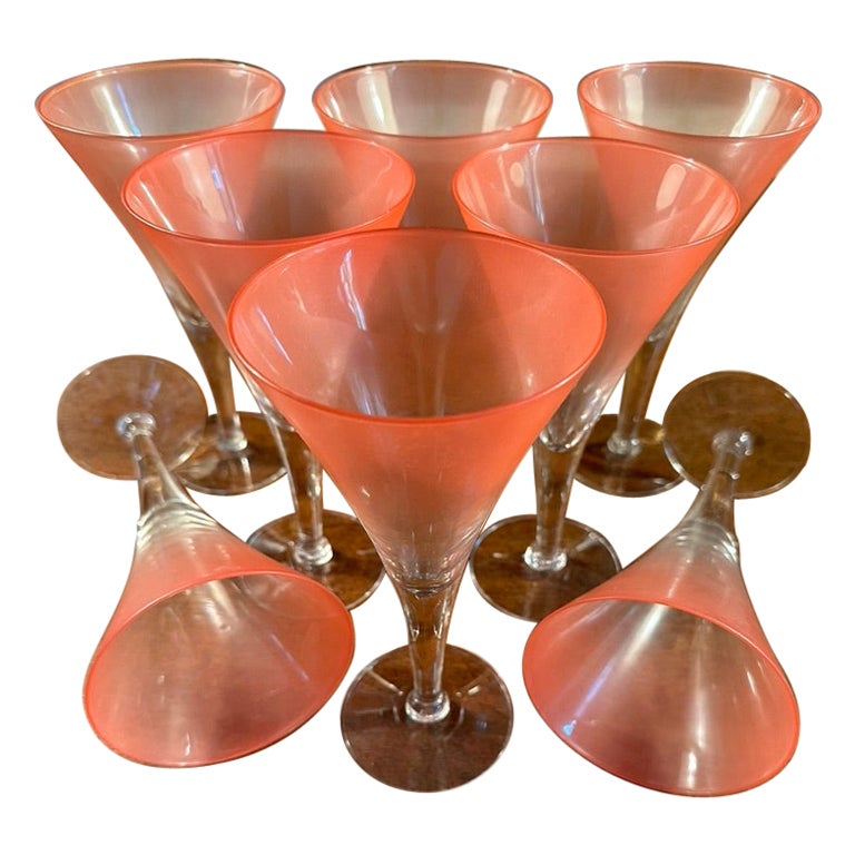 A set of eight wonderful soft rose tone Martini Glasses, very chic
and stylish. There are no chips or other marks on any of the
glasses.
Most conversations are centered around the liquid itself, shaken
or stired, or garnished with a twist?
One could