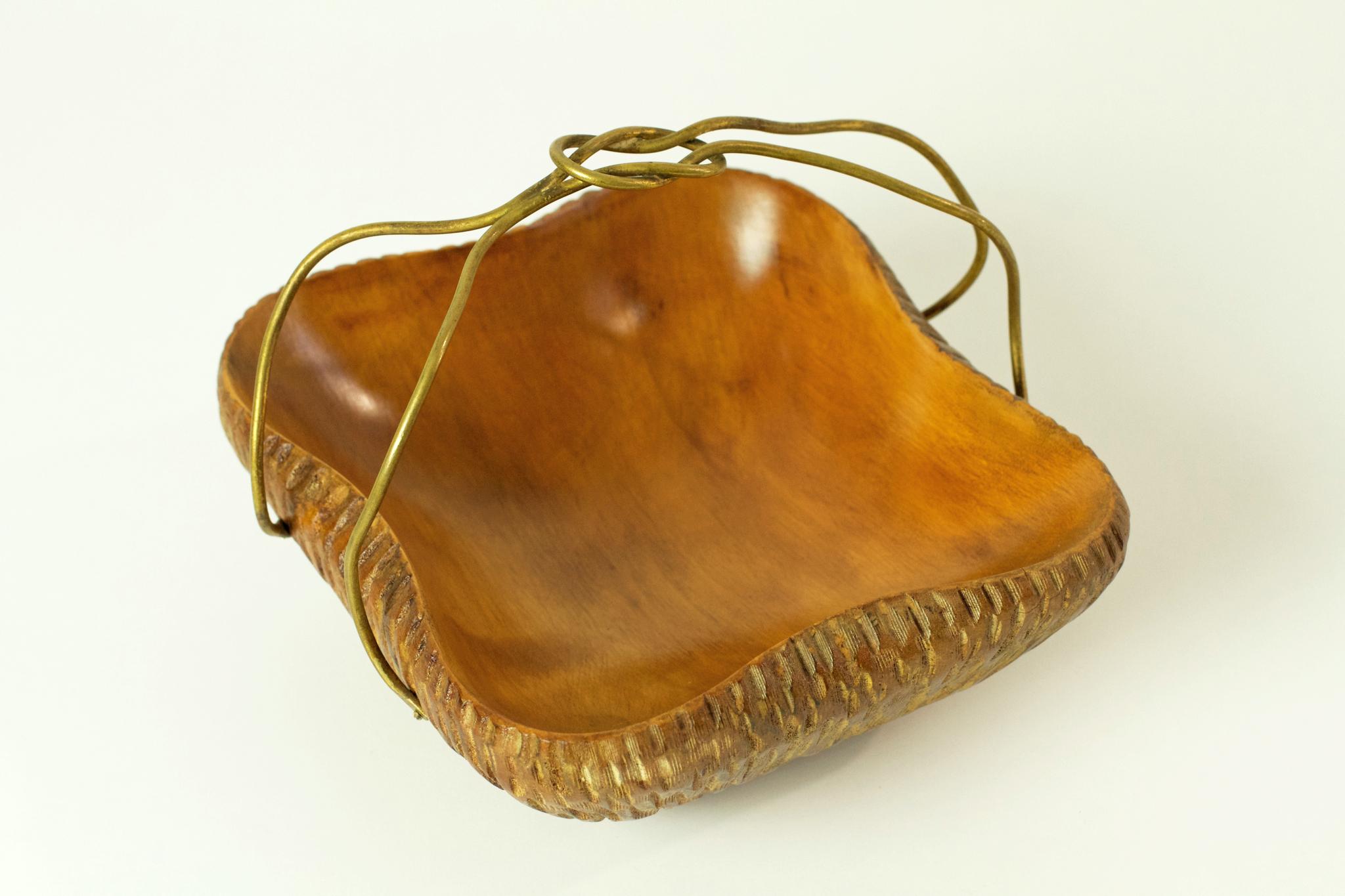 An artisanal basket handmade in the 1950's from maple wood and brass.