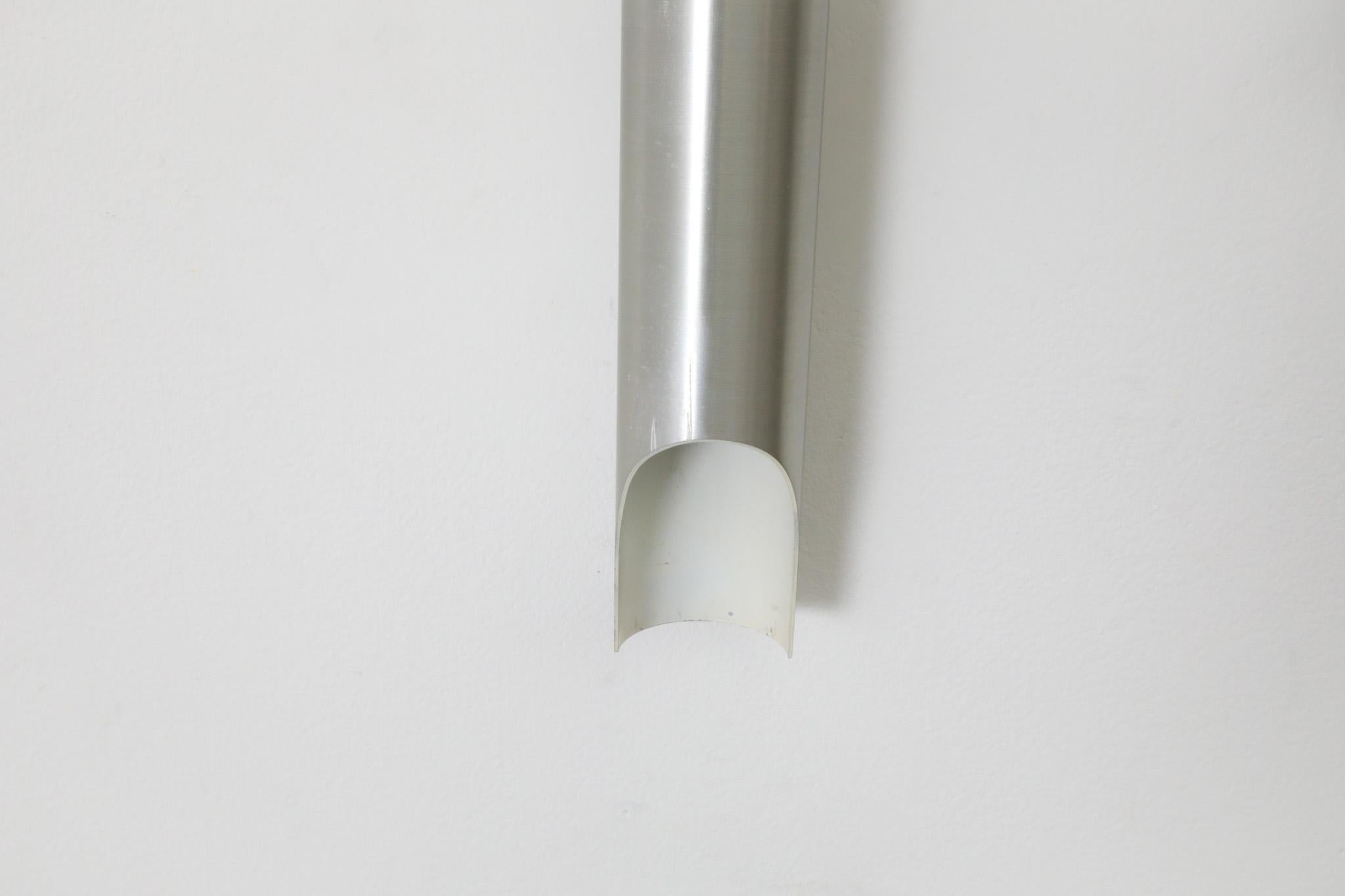 Mid-Century Fuga Aluminum Tubular Wall Lamps with Black Enameled Bases by RAAK For Sale 4