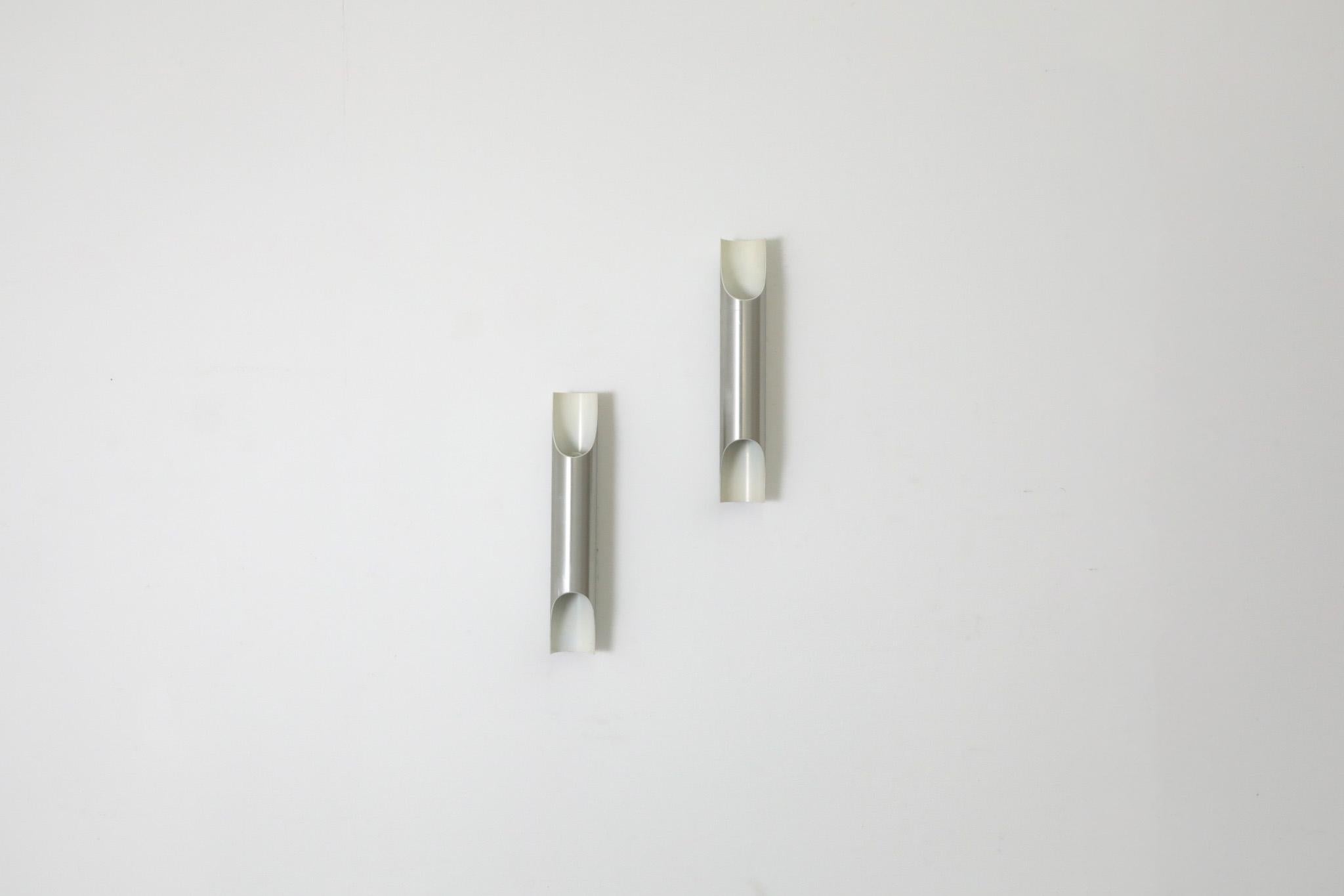 Space Age Mid-Century Fuga Aluminum Tubular Wall Lamps with Black Enameled Bases by RAAK For Sale