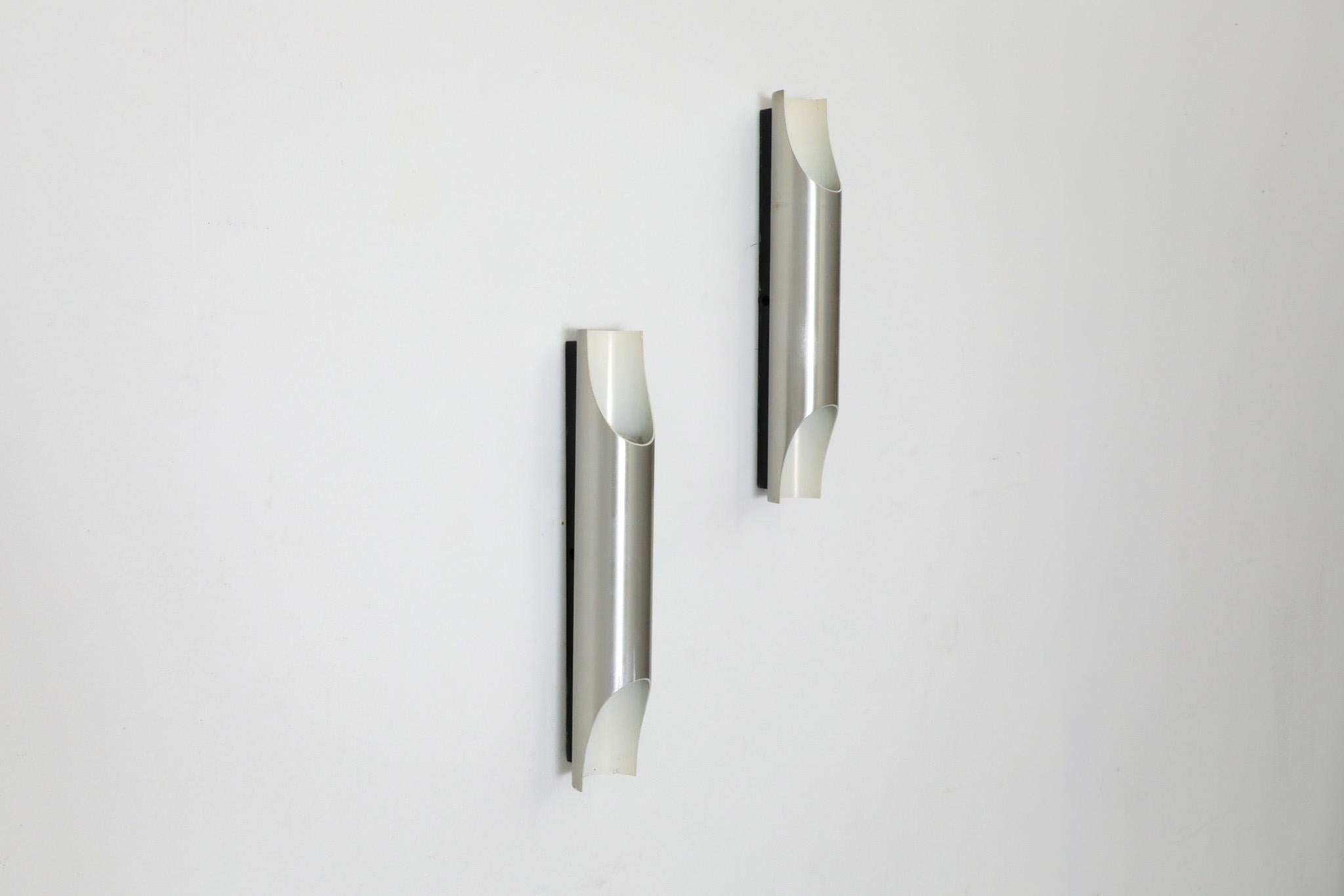 Mid-Century Fuga Aluminum Tubular Wall Lamps with Black Enameled Bases by RAAK In Good Condition For Sale In Los Angeles, CA