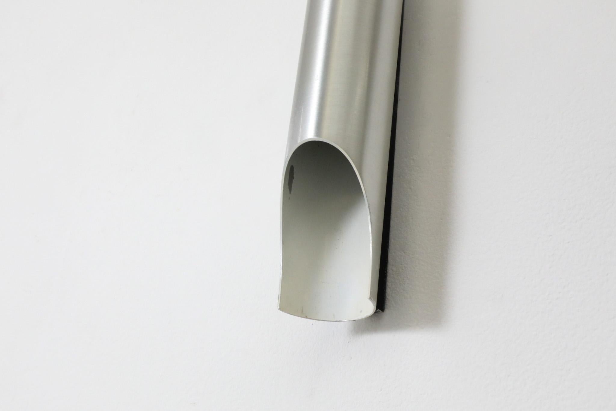 Metal Mid-Century Fuga Aluminum Tubular Wall Lamps with Black Enameled Bases by RAAK For Sale