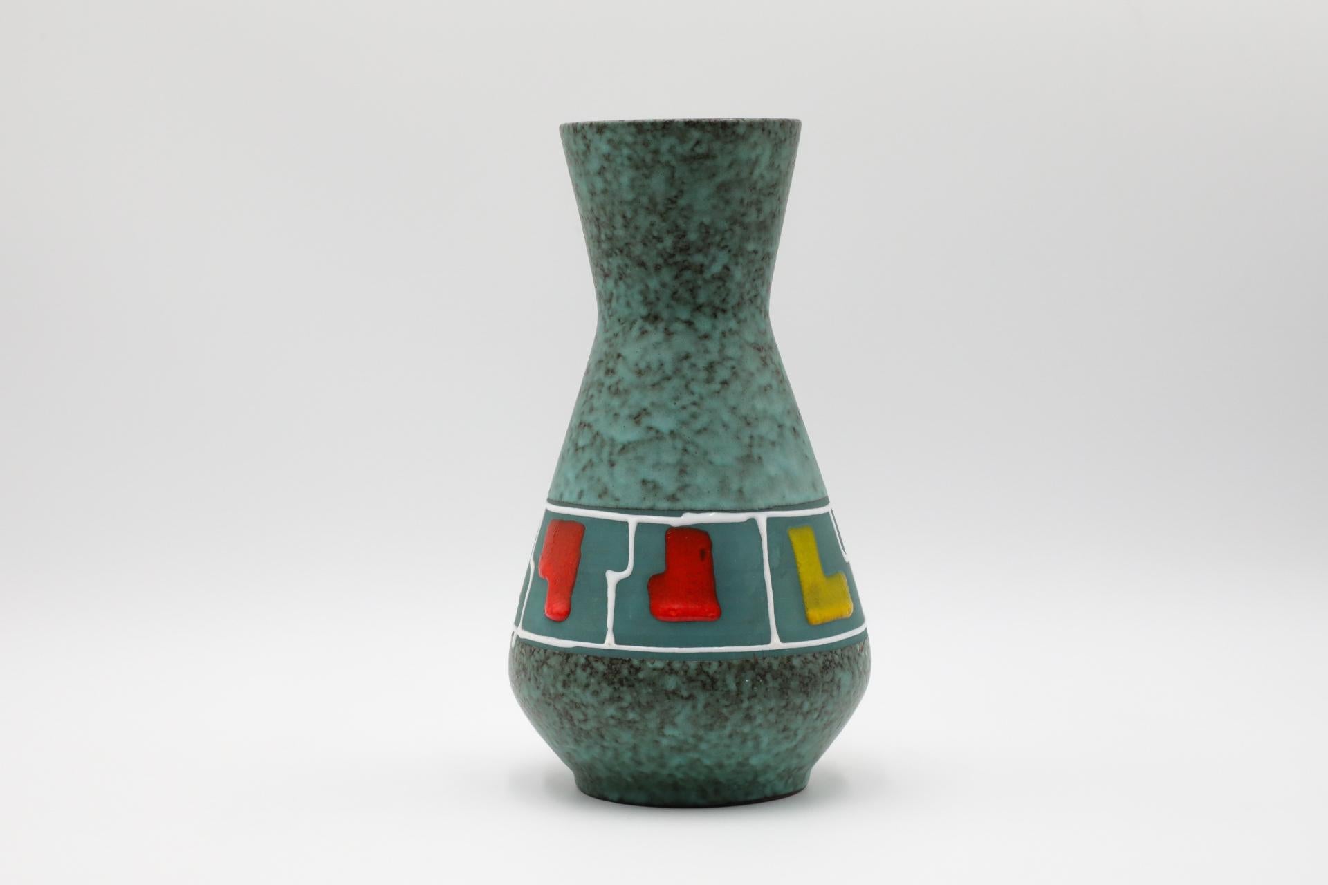 Beautiful West German vase. Marked '1218-29' on bottom. Regarded as the golden age of ceramics, highly collectable 1950s-1970s Art Pottery is known for experimental and exploratory glazes, shapes, colors, and forms. With over 100 manufacturers at
