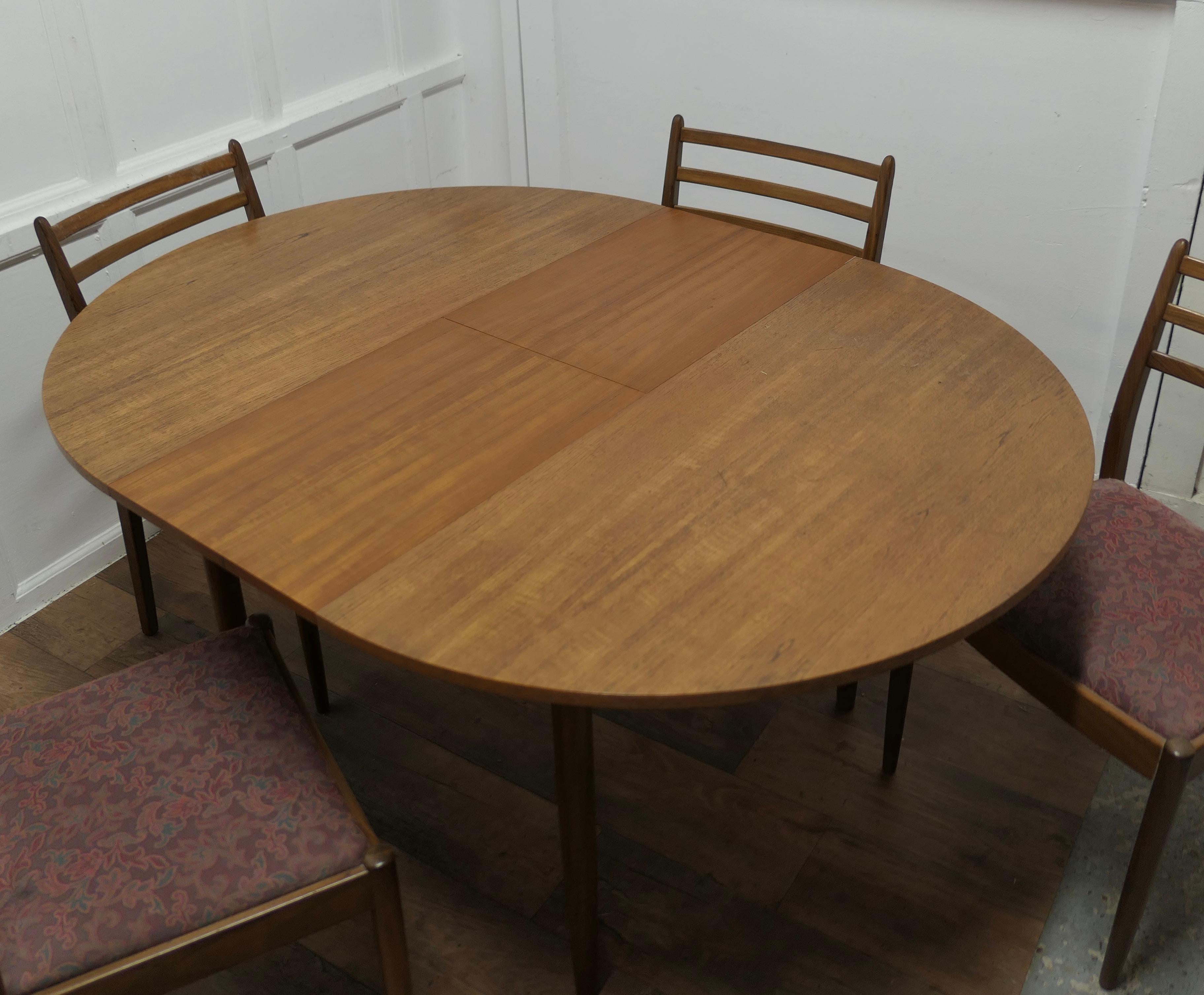Mid-20th Century Mid Century G Plan Circular Extending Dining Table and 4 Chairs    For Sale