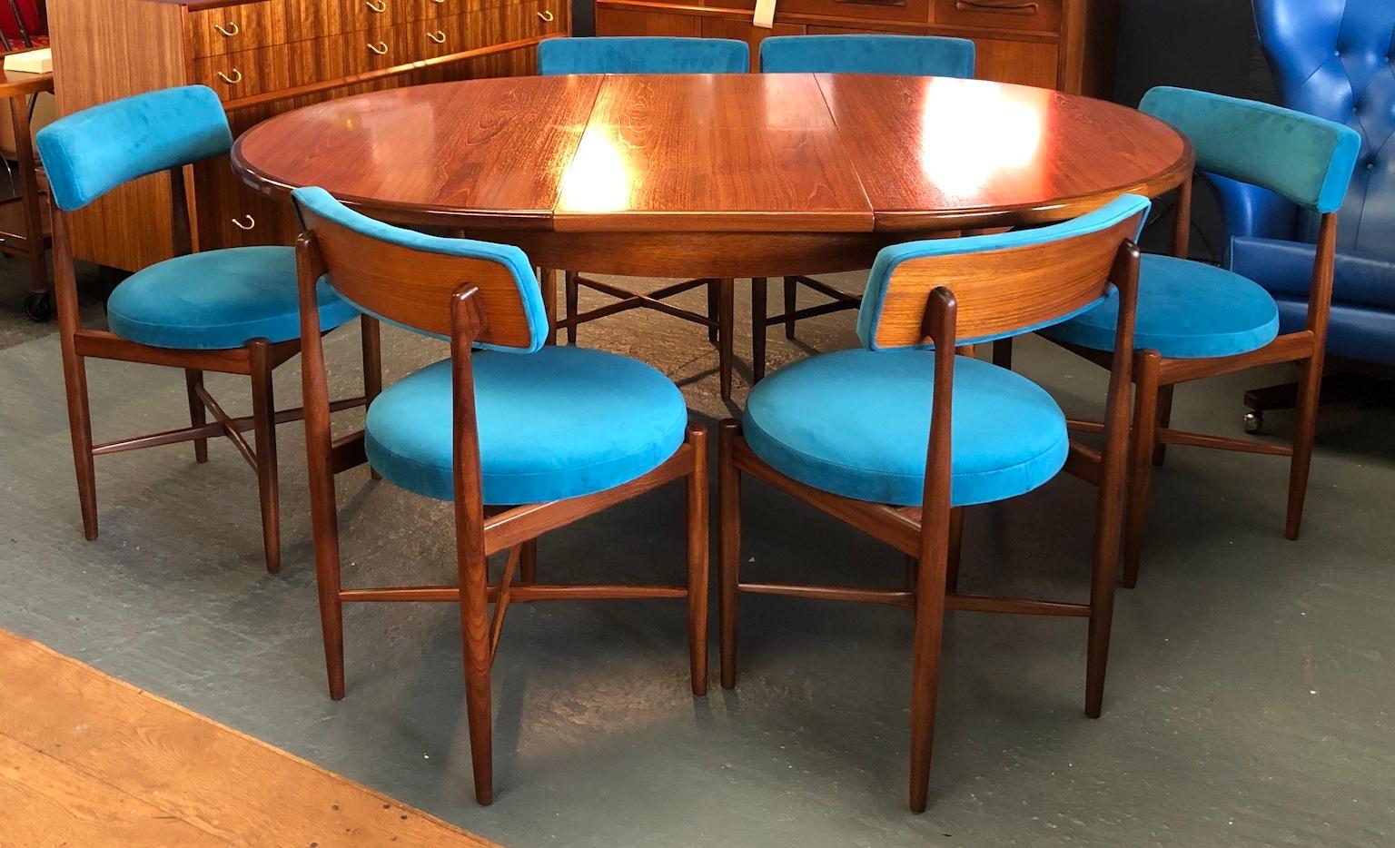 Midcentury G plan ‘Fresco’ dining table & 6 x chairs by V B Wilkins, 1960s

Dining set consisting of teak dining table plus 6 teak and upholstered chairs. Designed by Victor Wilkins for G-plan in the 1960s
The table has a hidden butterfly leaf