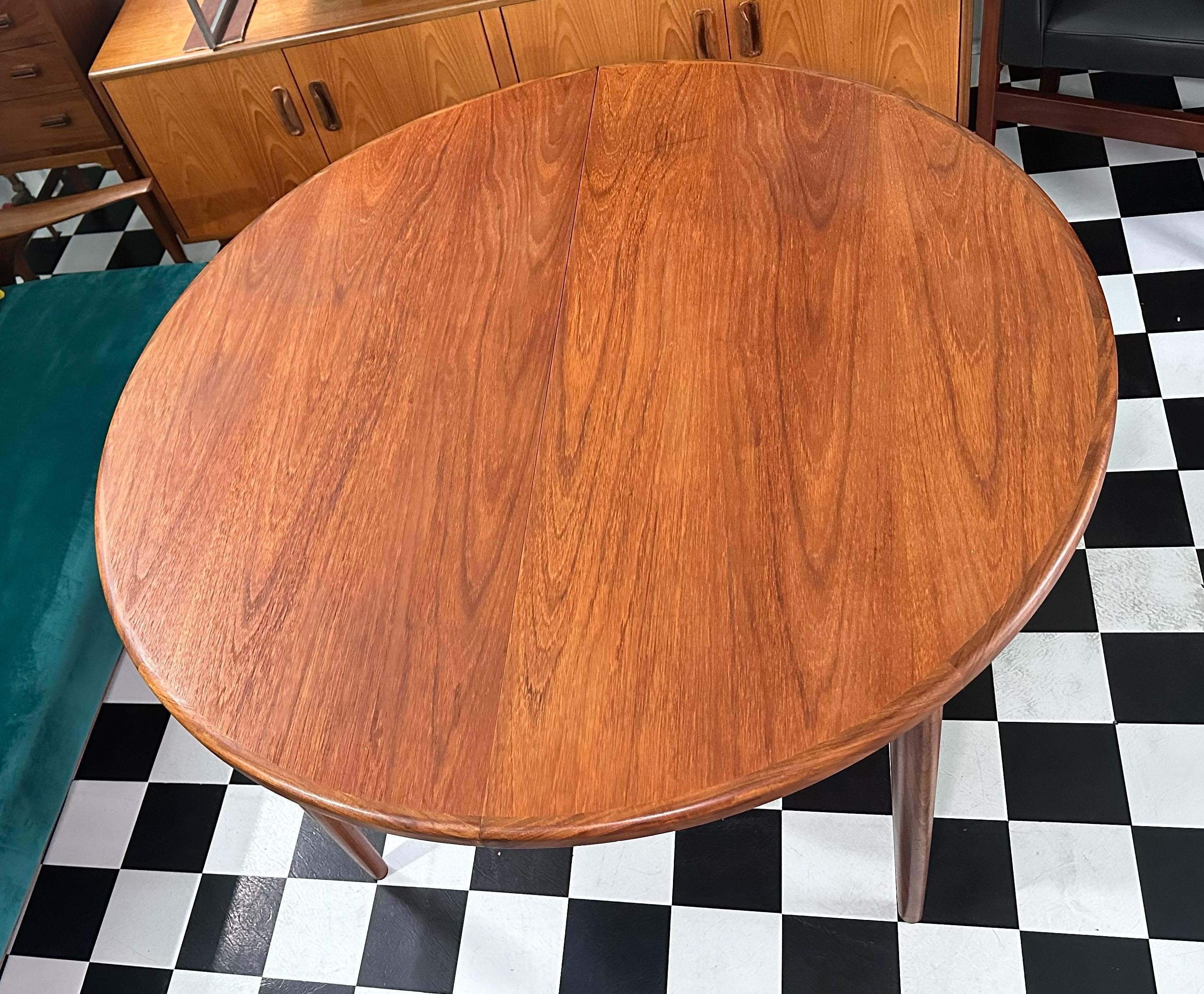 Beautiful G Plan Fresco teak dining table. It has an extending butterfly leaf that tucks neatly away when not in use underneath. Stunning design with an elegant rich teak grain. Very practical round shape, sits up to six when extended.
 
It’s in