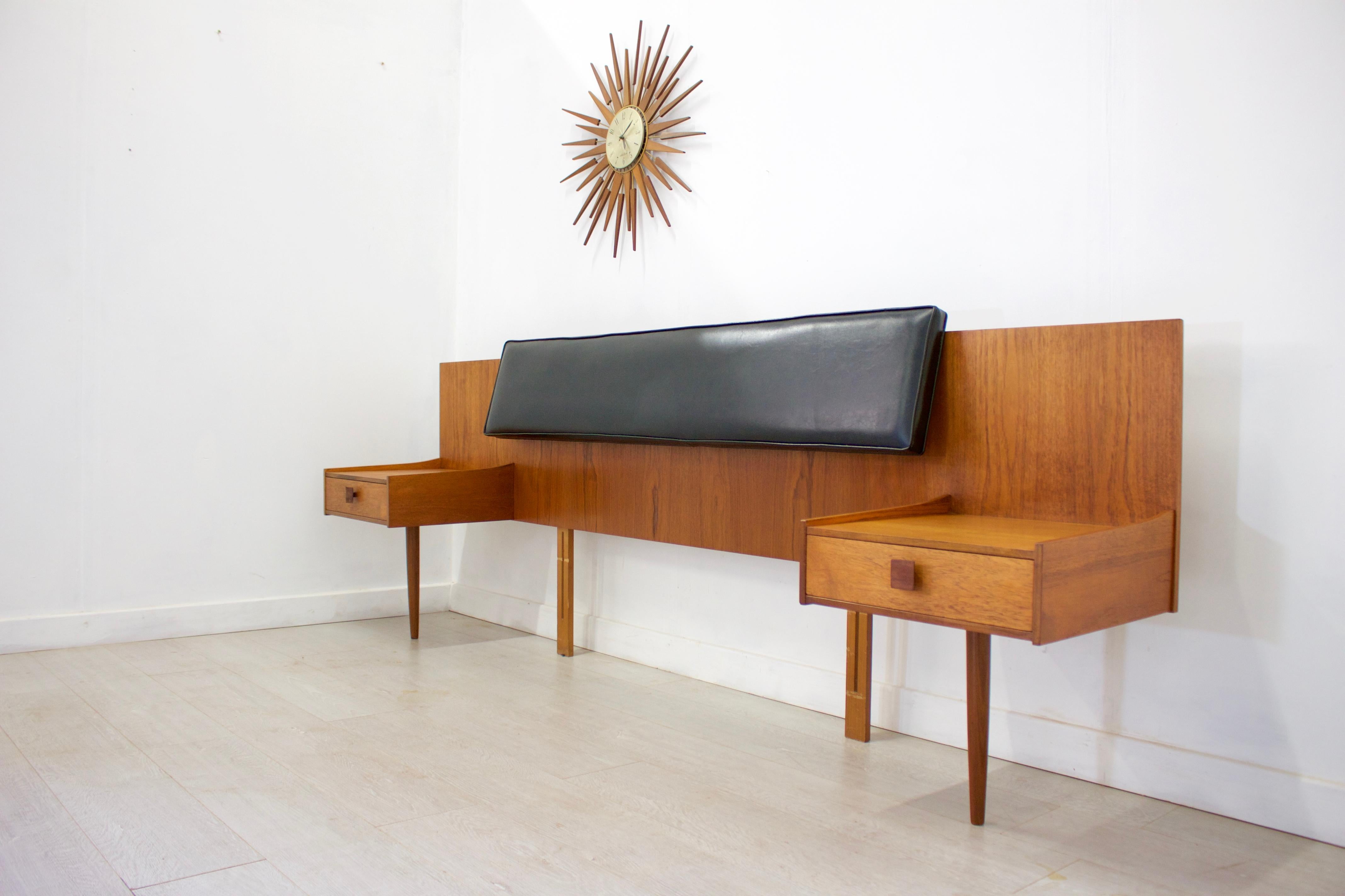 Midcentury G Plan Kofod-Larsen Danish headboard and bedside tables

This is a very stylish Danish teak headboard and bedside tables designed by Kofod-Larsen for G-Plan.
This is a rare piece, as they were significantly more expensive than other