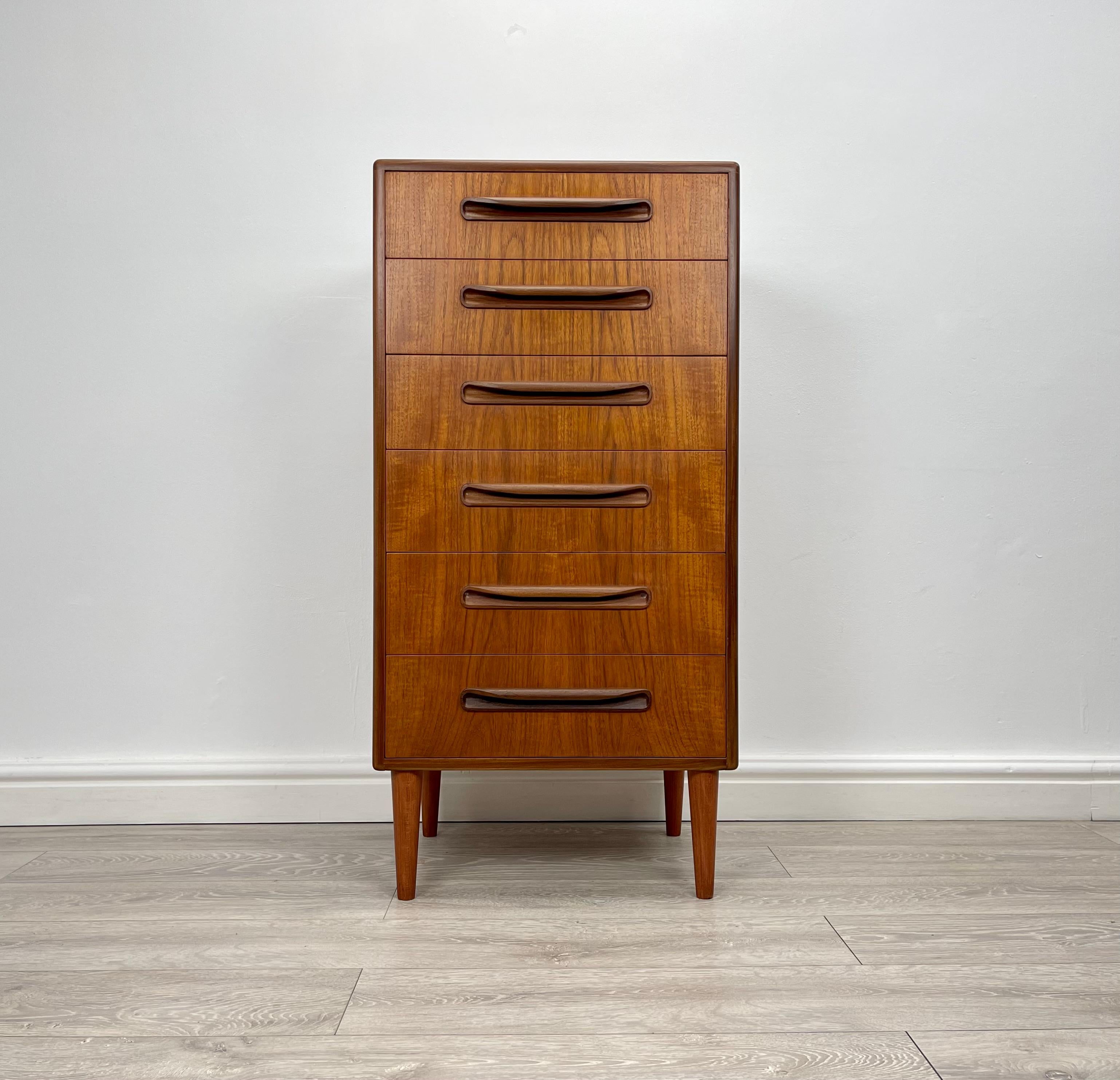 CHEST OF DRAWERS 
Midcentury teak tallboy chest of drawers made by G Plan fresco  range circa 1960 .

The chest of drawers has stunning grain and golden patina throughout.

There’s six good size drawers fitted with solid teak handles all drawers run
