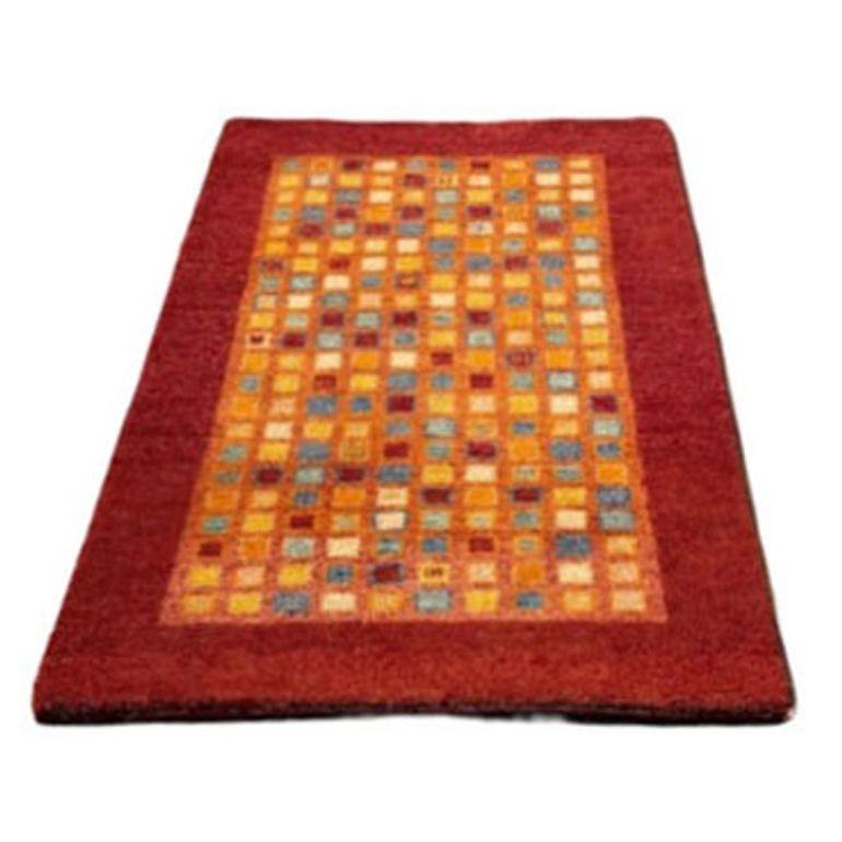 Enhance your space with this wool abstract Mid-century area rug. Featuring a captivating blend of geometric shapes and vibrant hues, this rug fashions after the rugs made famous by the Gabbeh Tribe.

Dimensions: Height: 35