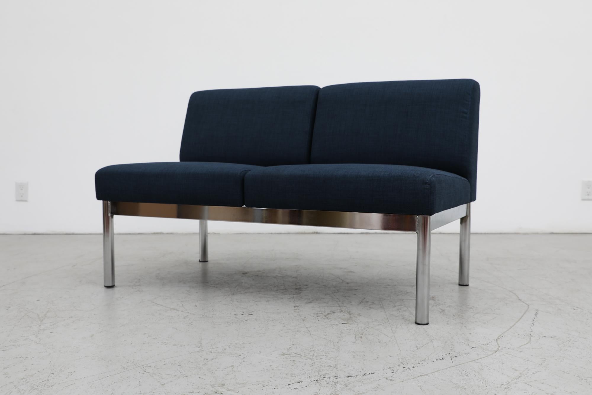 Mid-Century Gelderland style 3 seater sofa with chrome frame and newly upholstered sapphire blue cushions.These are easy to swap positions by simply unscrewing from the base and flipping the seat or table direction, or swapping with a different