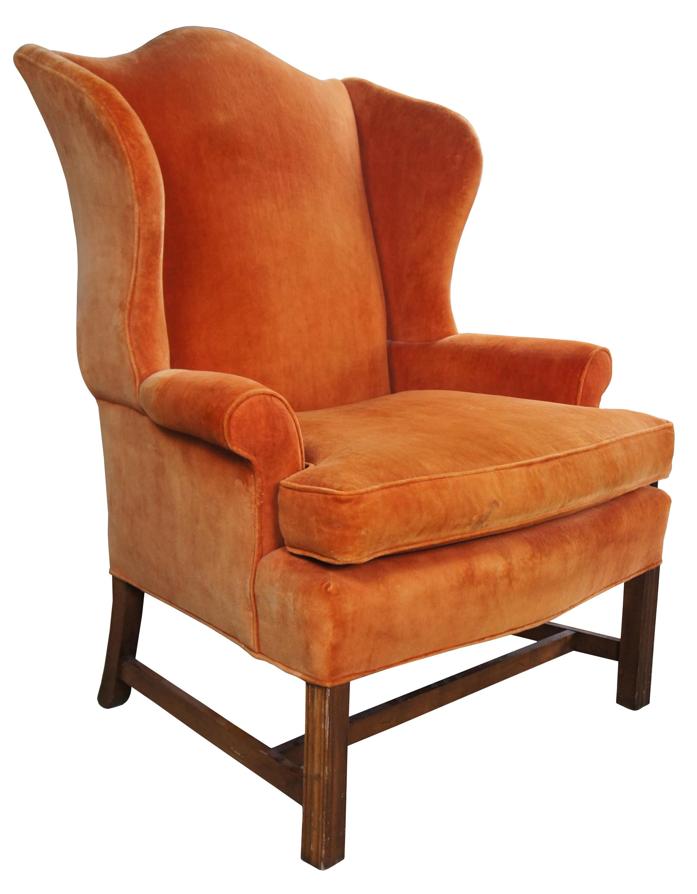 orange velvet wingback chair
