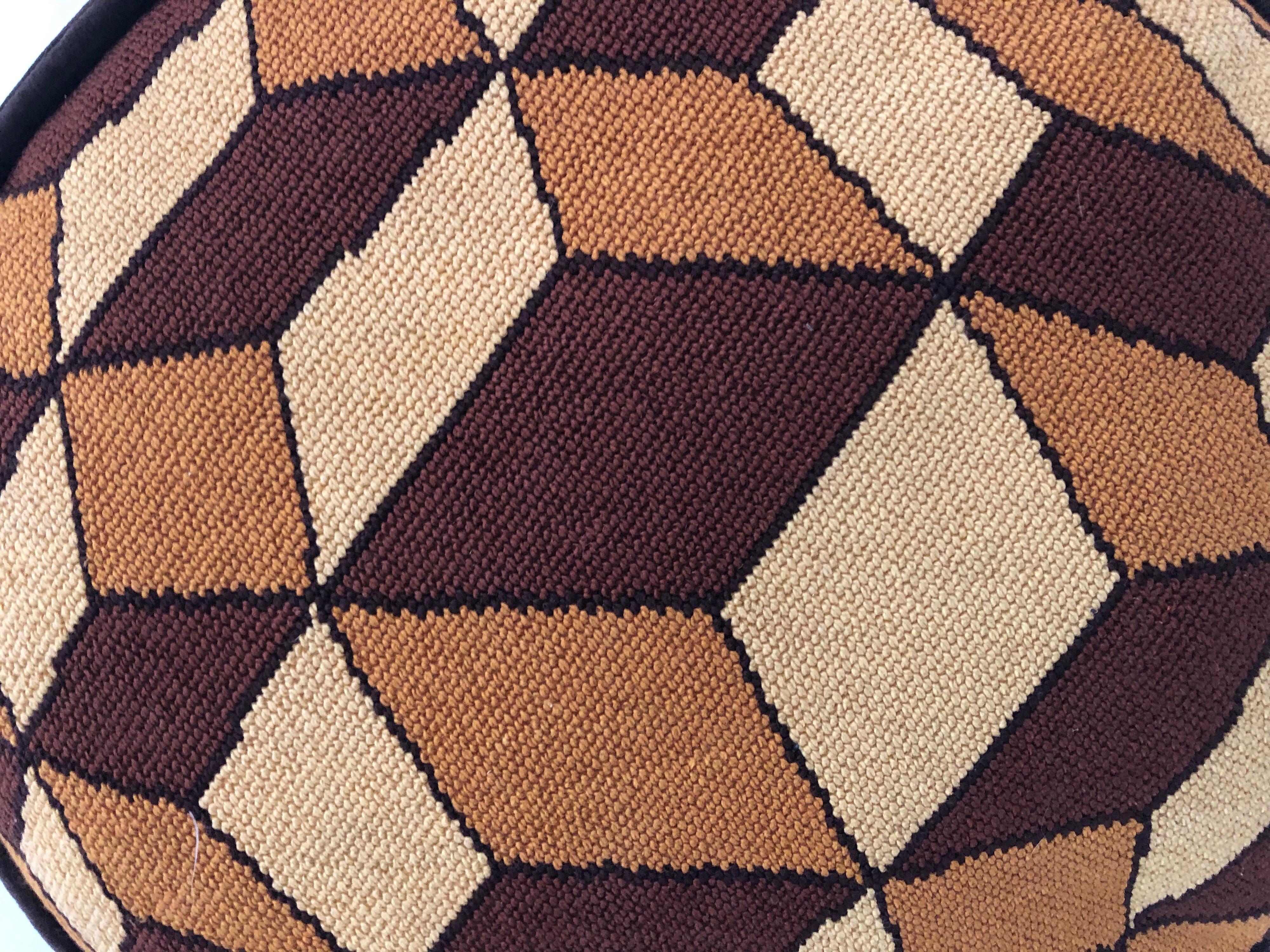 An interesting handmade midcentury geometric oval pillow with brown velvet back. Tones of yellow, mustard, and brown. Two associated pillows also available.