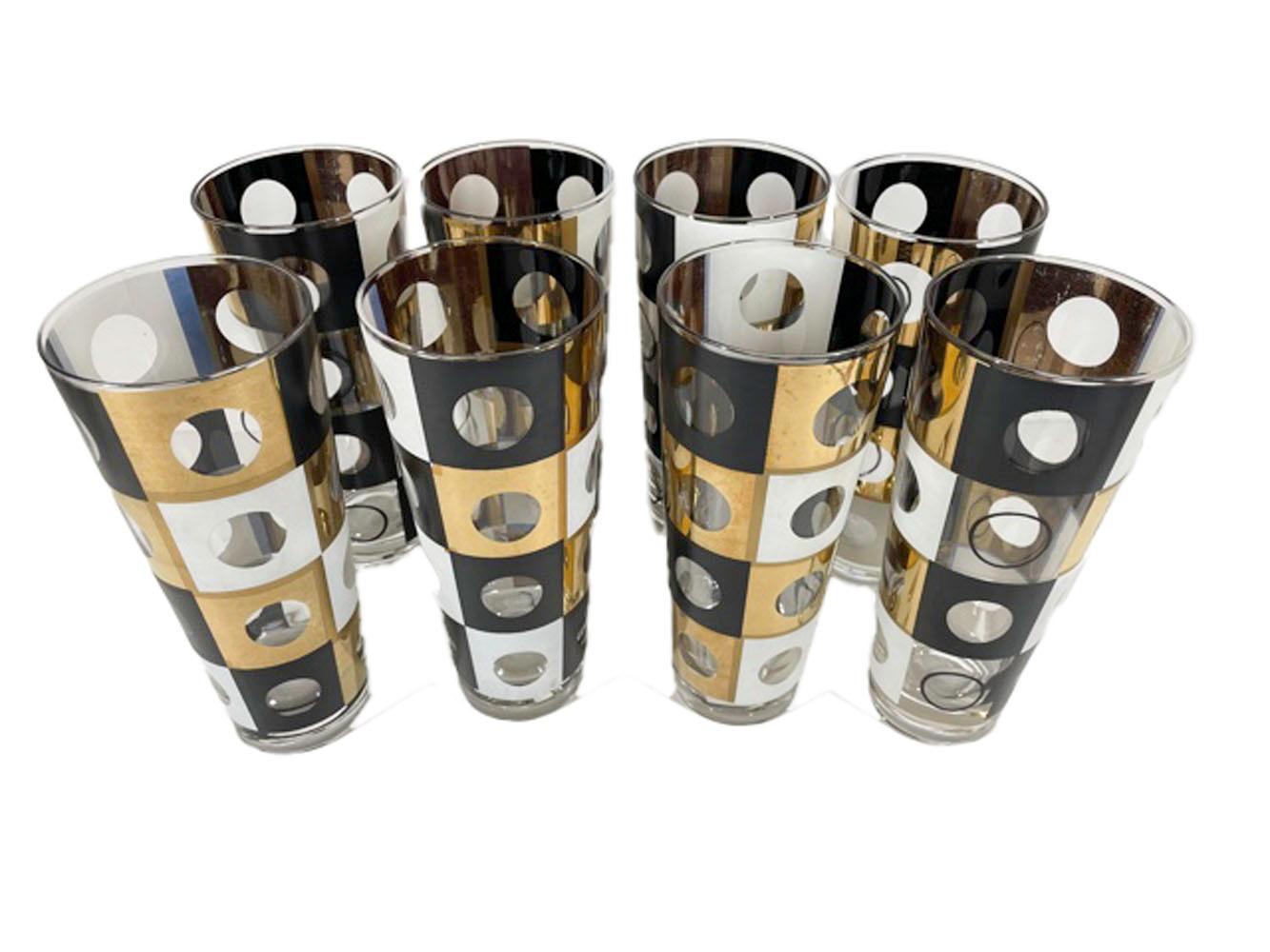Set of 8 Mid-Century Modern Tom Collins glasses in a black and white enamel with 22k gold design of squares with clear circles in the center of each.