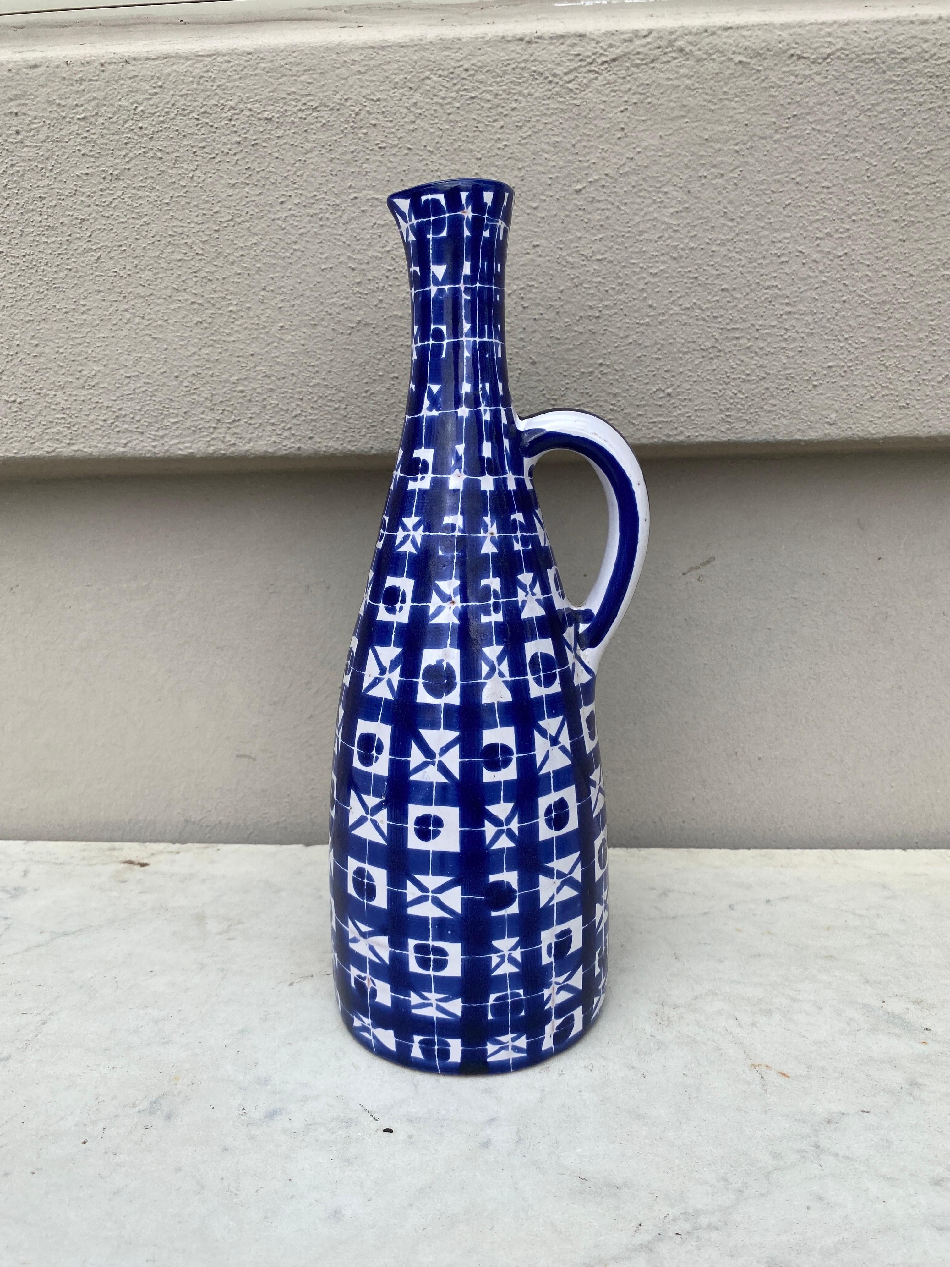 Blue & white Geometrical Pitcher or Bottle signed Robert Picault circa 1950.
Robert Picault (1919 - 2000) was born in Vincennes, Paris and studied at the School of Applied Arts in Paris. After the war he spent a short time teaching drawing and in