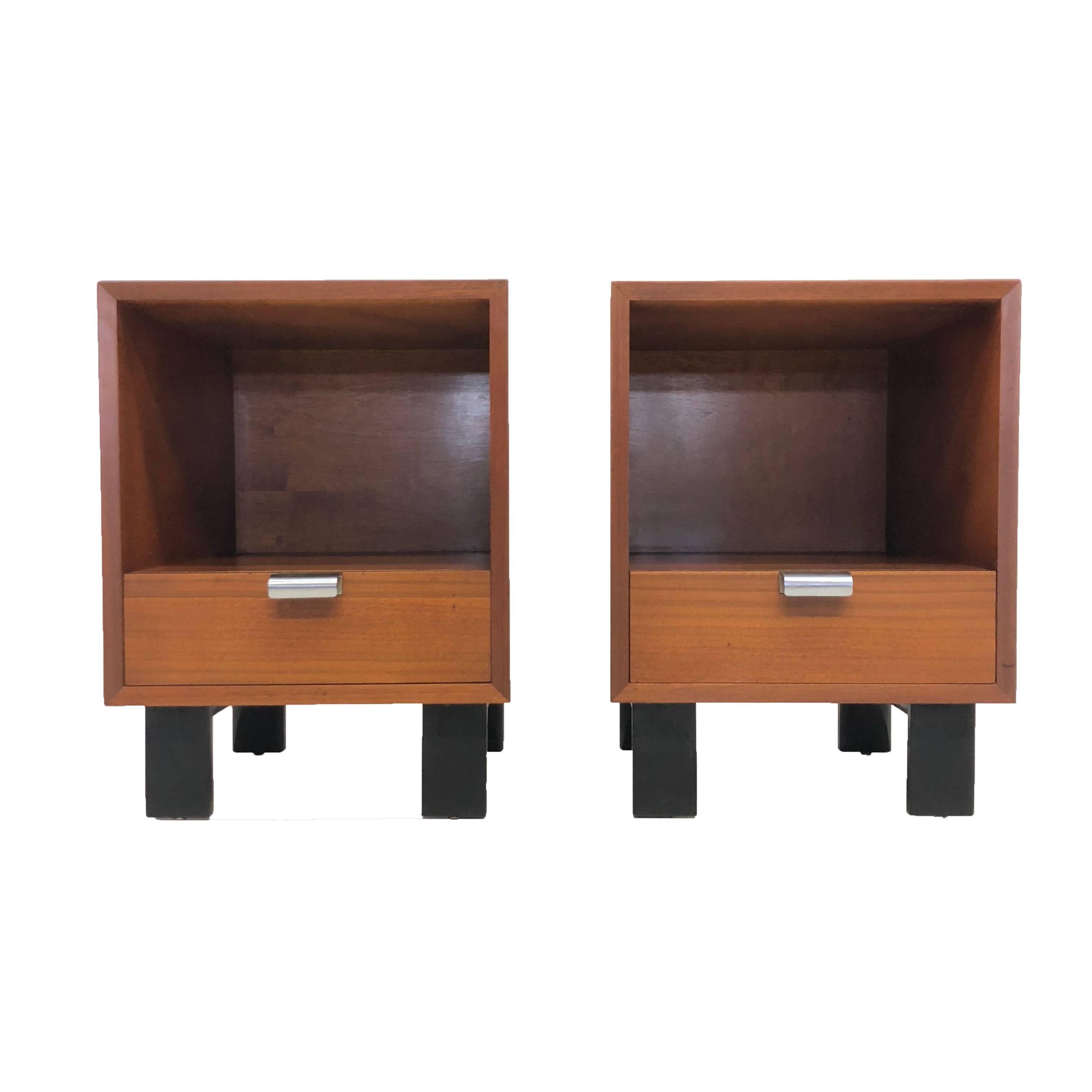Pair of midcentury George Nelson for Herman Miller side tables, part of the Basic Storage Components that George Nelson designed for Herman Miller in 1952. Table tops have some losses and age appropriate wear as seen in photos.

May be purchased
